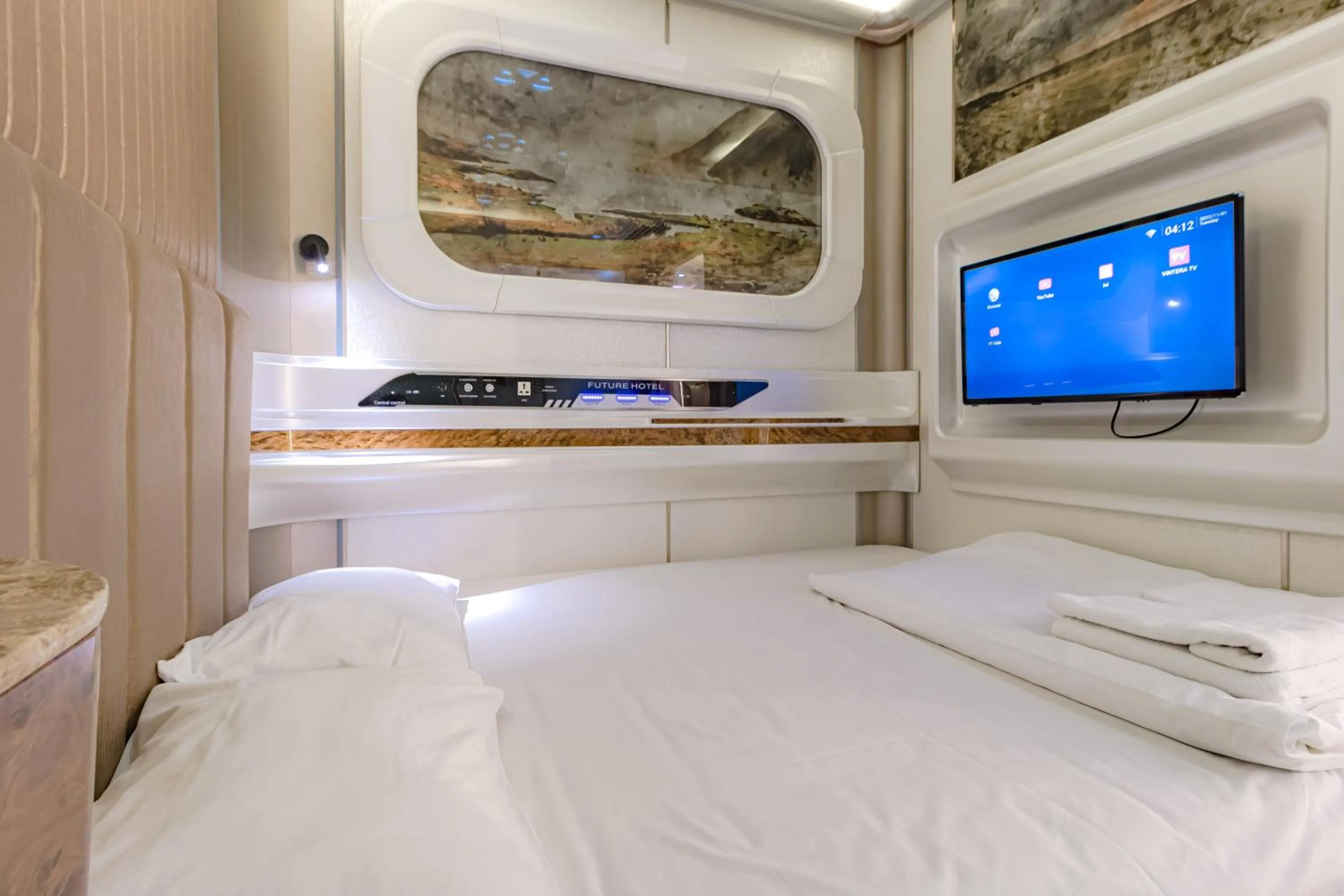 Bed in CAPS LOCK Future Hotel