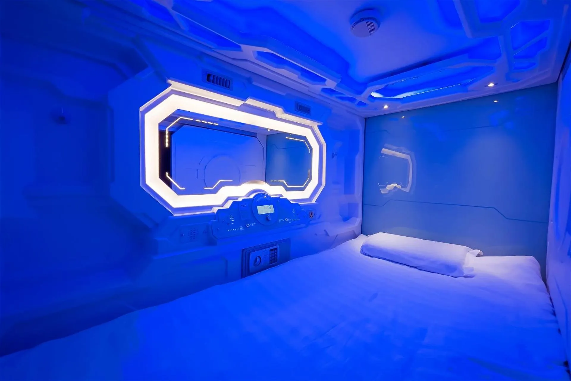 Bed in CAPS LOCK Future Hotel