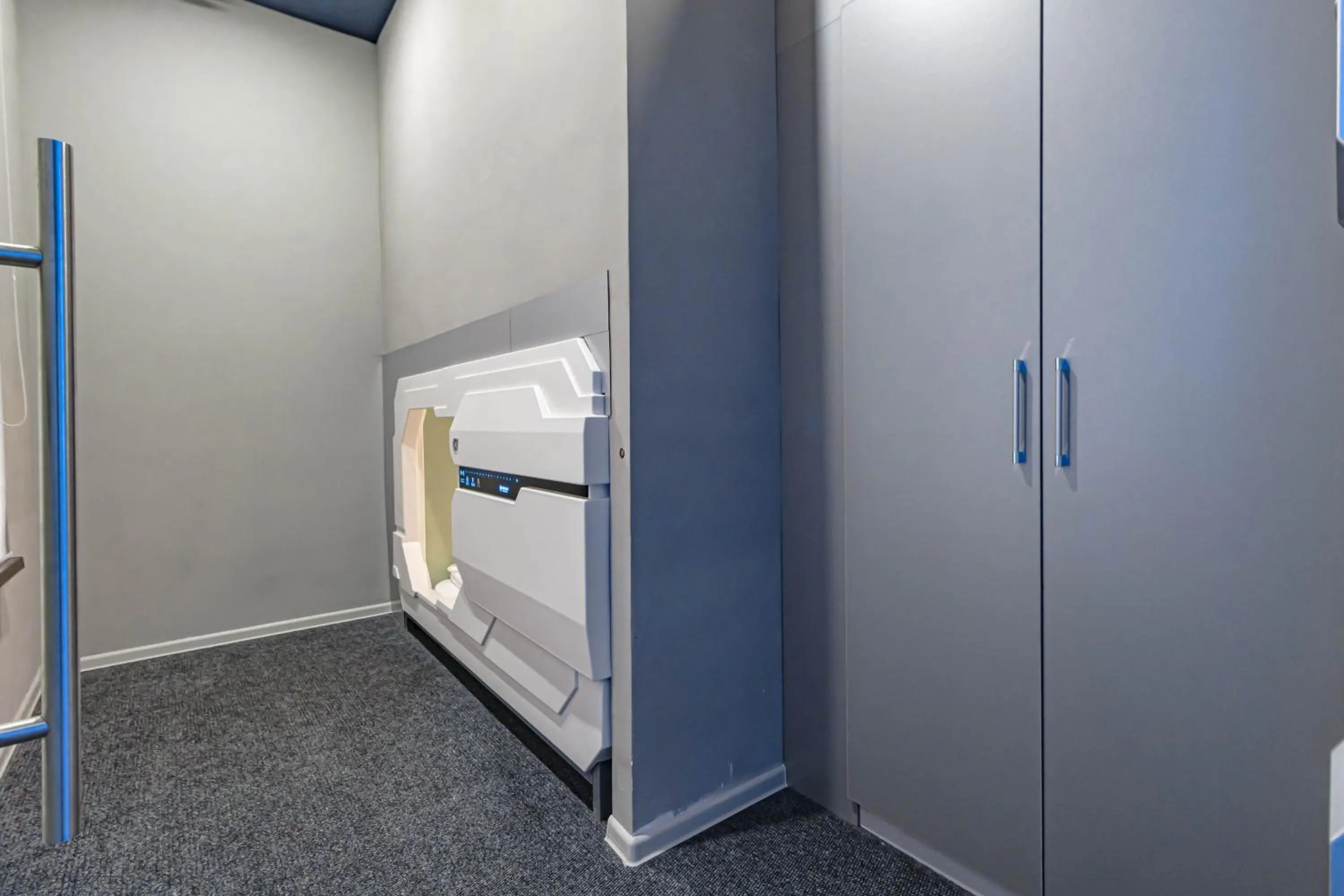 Bed in CAPS LOCK Future Hotel