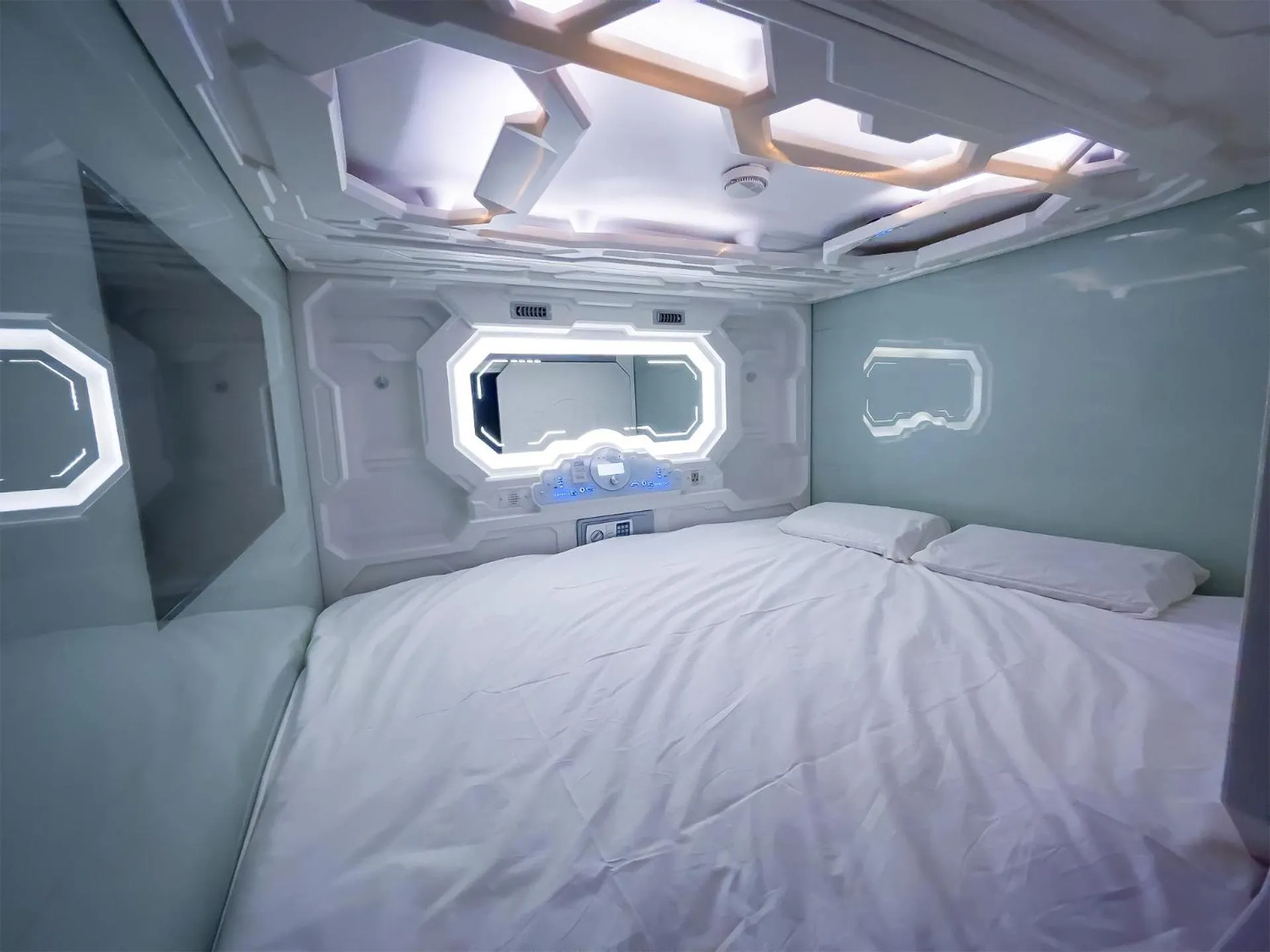 Bed in CAPS LOCK Future Hotel