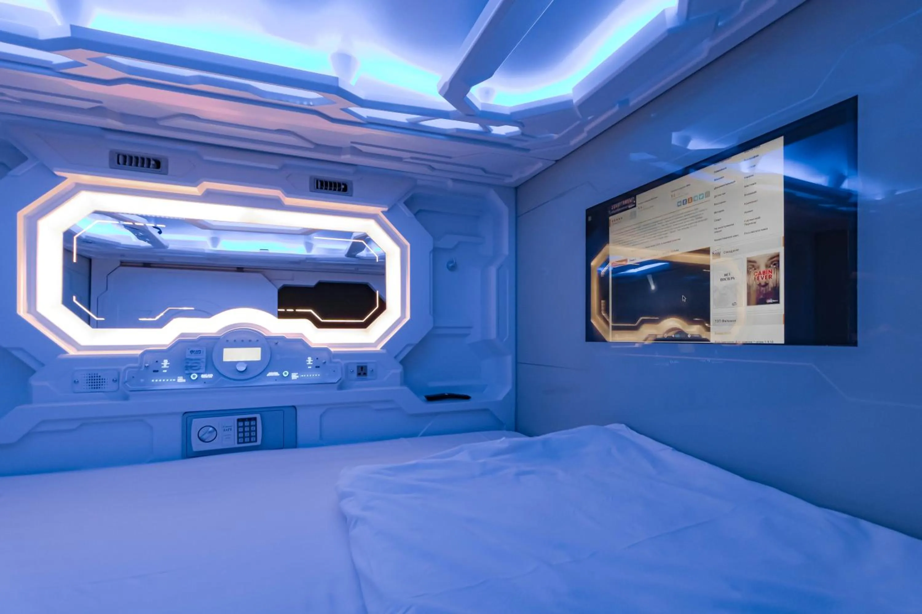 Bed in CAPS LOCK Future Hotel