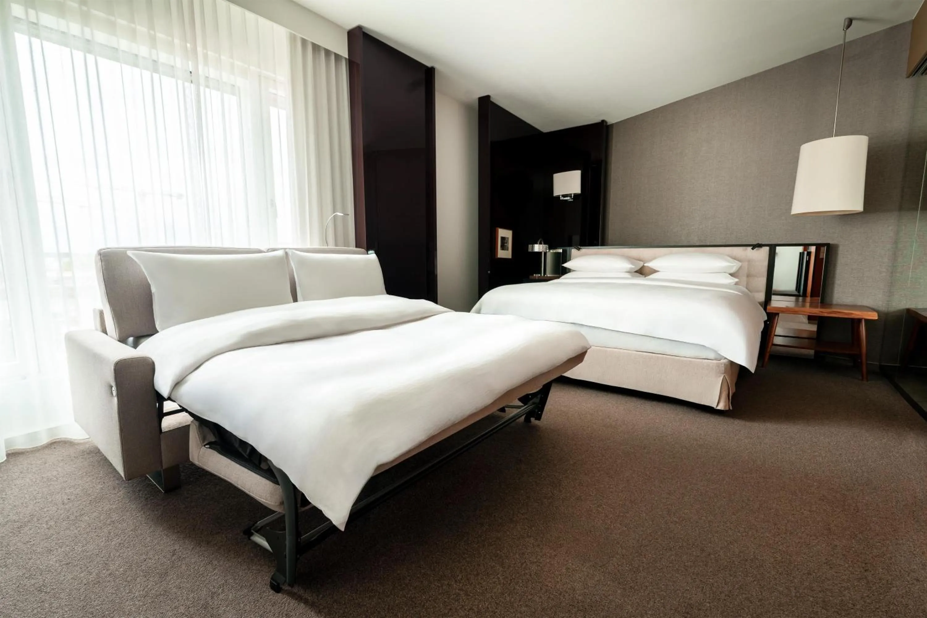 Photo of the whole room, Bed in Grand Hyatt Berlin