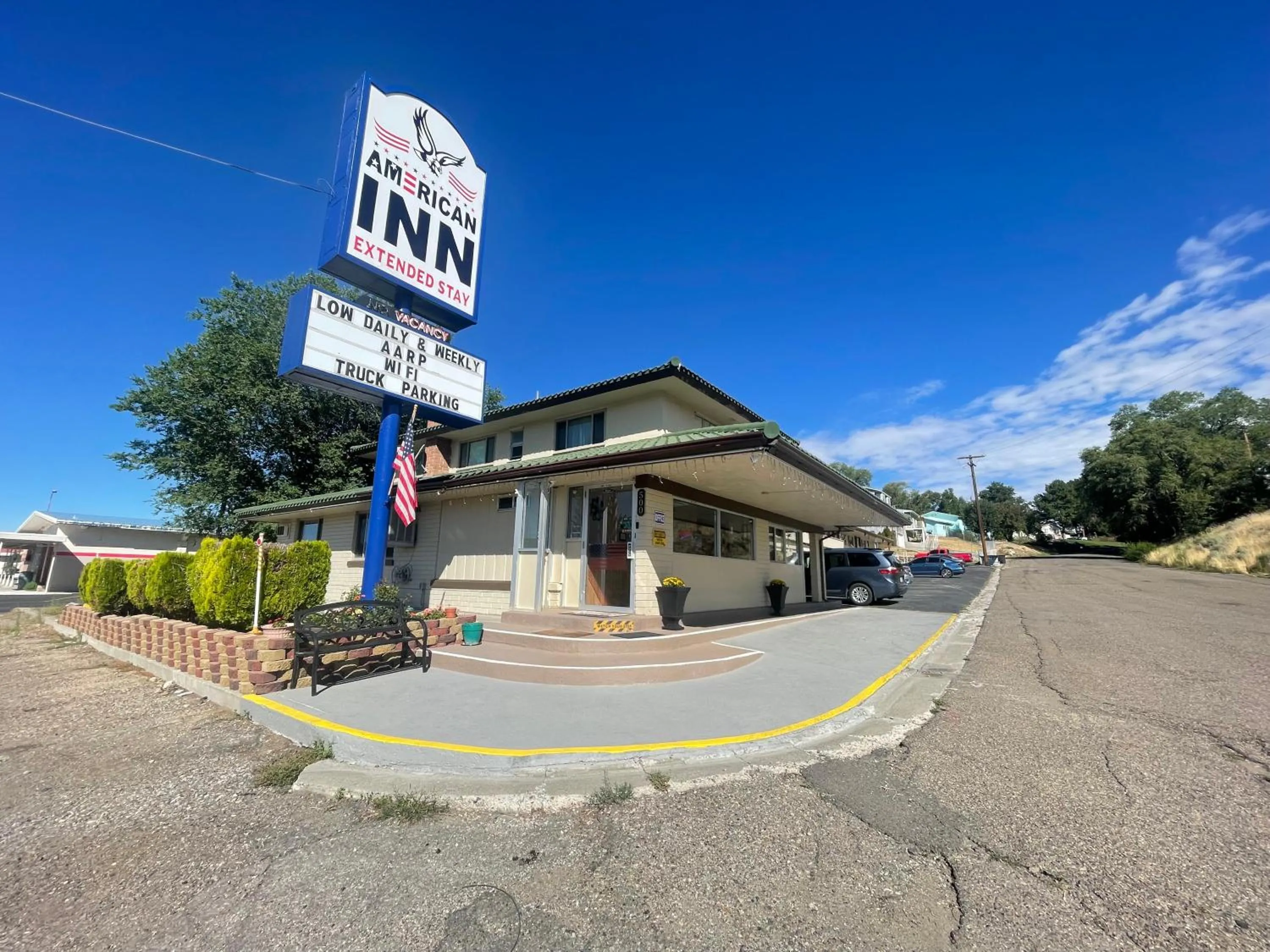 Property logo or sign in American inn
