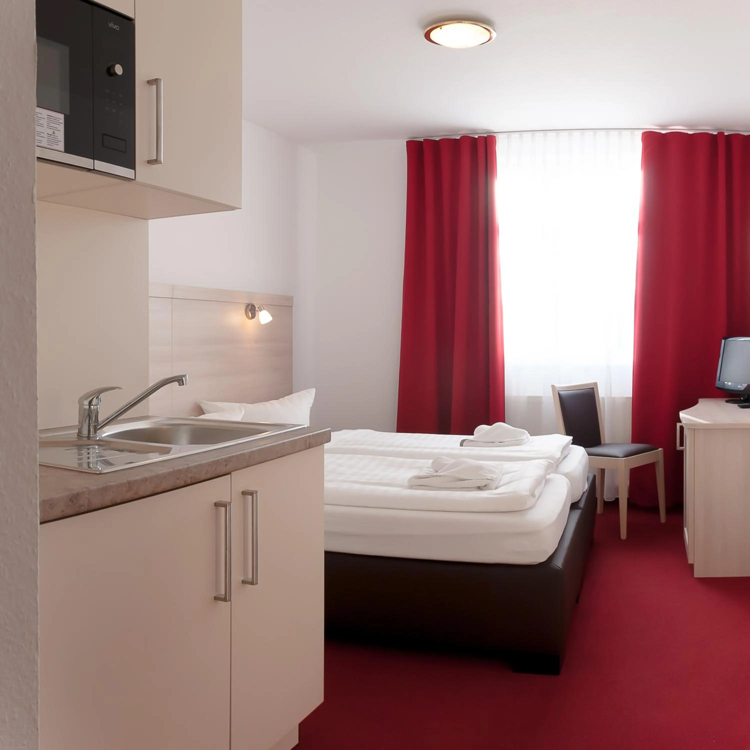 Photo of the whole room, Bed in Apart Hotel Ferdinand Berlin