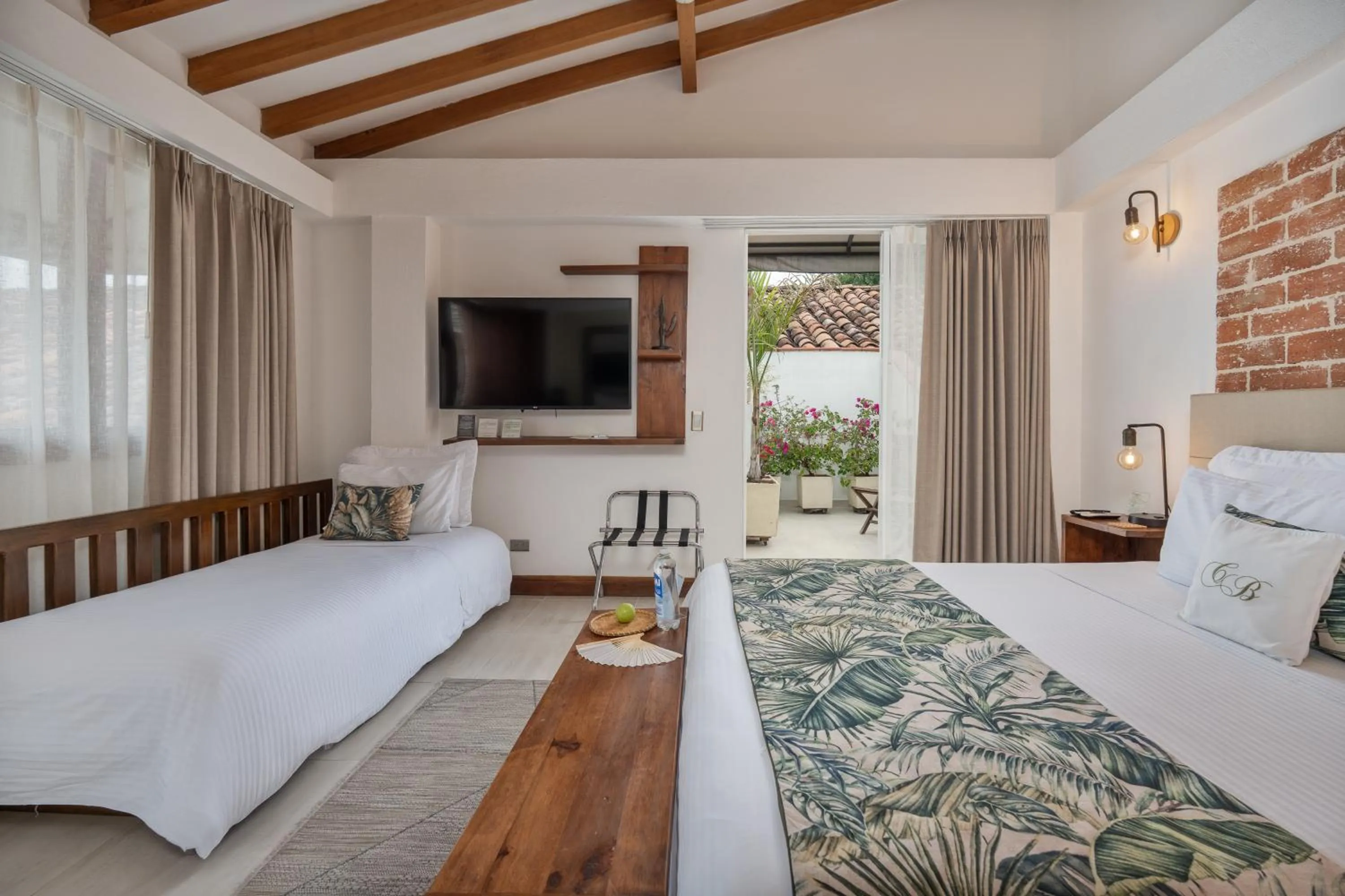 TV and multimedia, Bed in Casa Bixa Hotel Boutique -Santa Fe de Antioquia- Mayores de 12 años