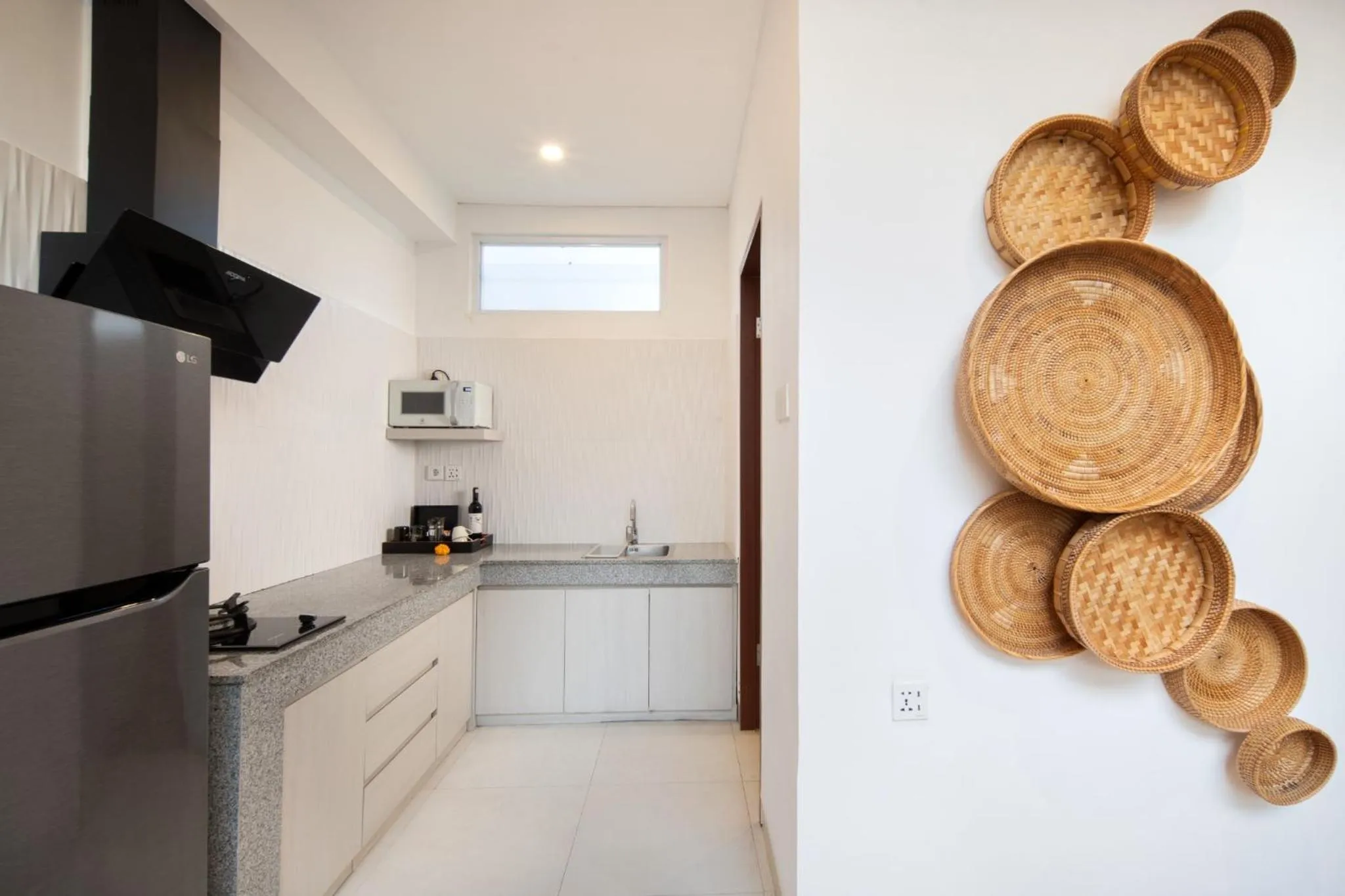 Kitchen or kitchenette in Aeera Villa Canggu by Ini Vie Hospitality