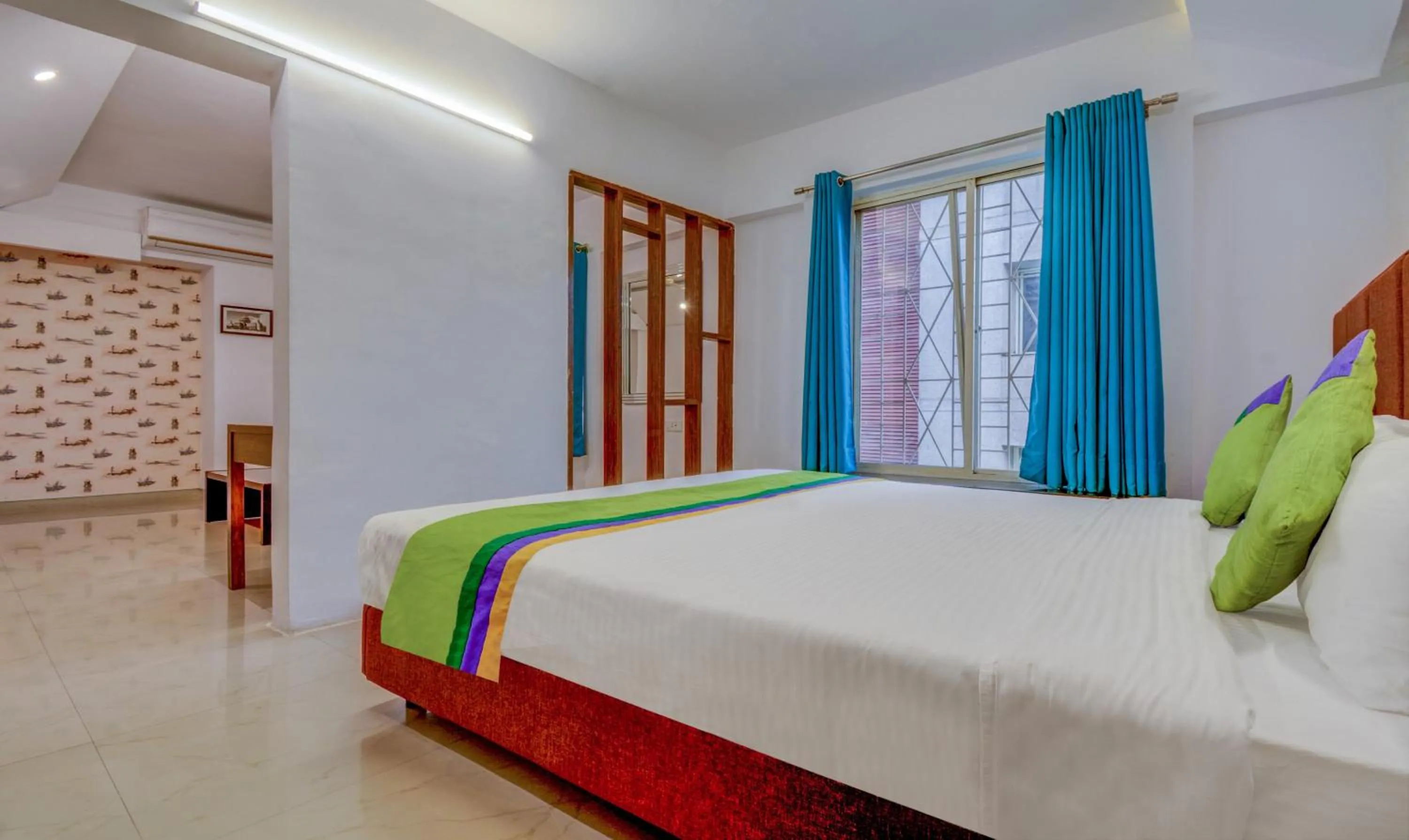 Bedroom, Bed in Treebo Iris Suites