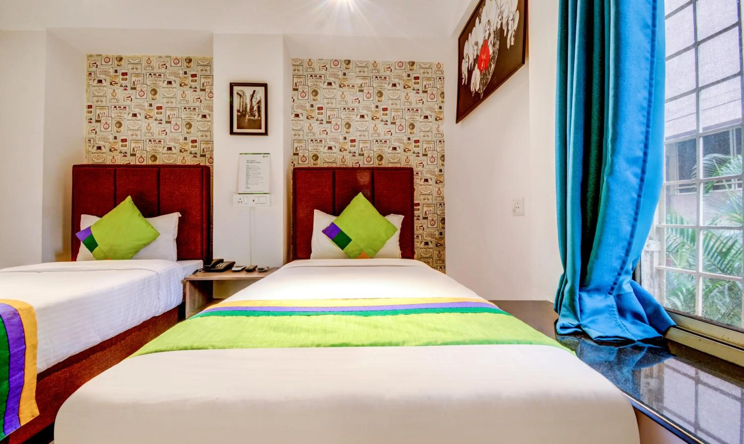 Bedroom, Bed in Treebo Iris Suites