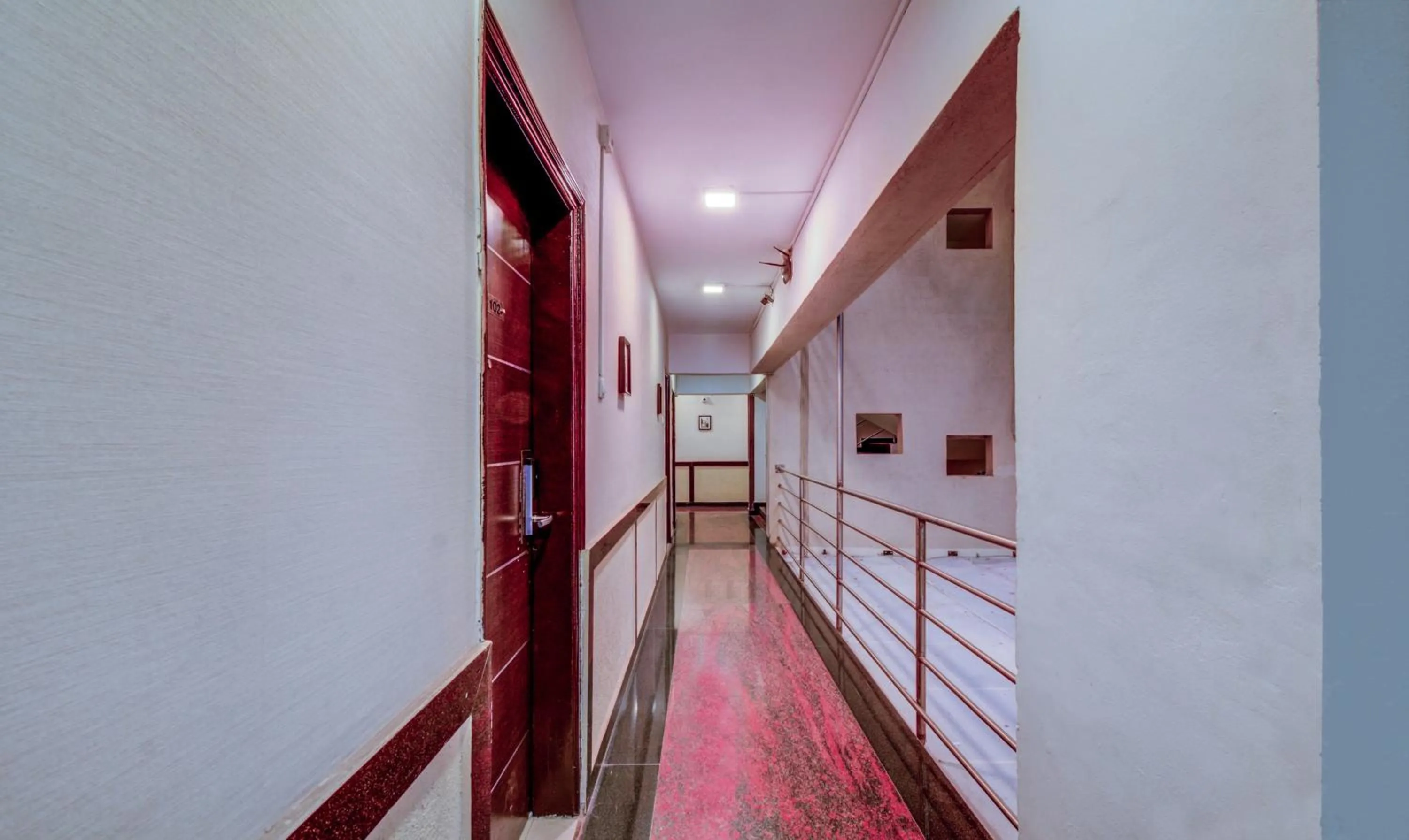 Lobby or reception, Bed in Treebo Iris Suites