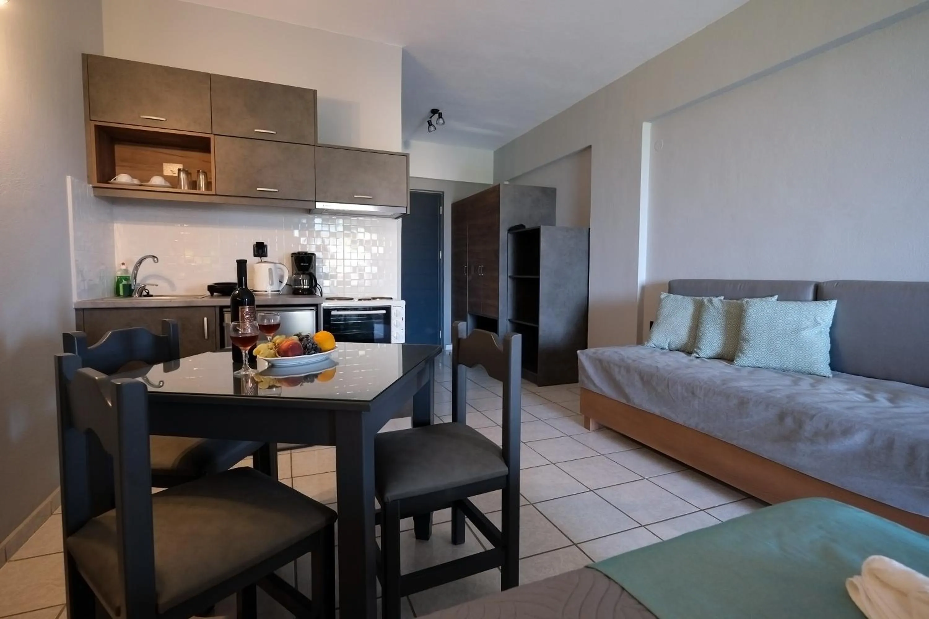 Dining area, Bed in Poledas Apartments