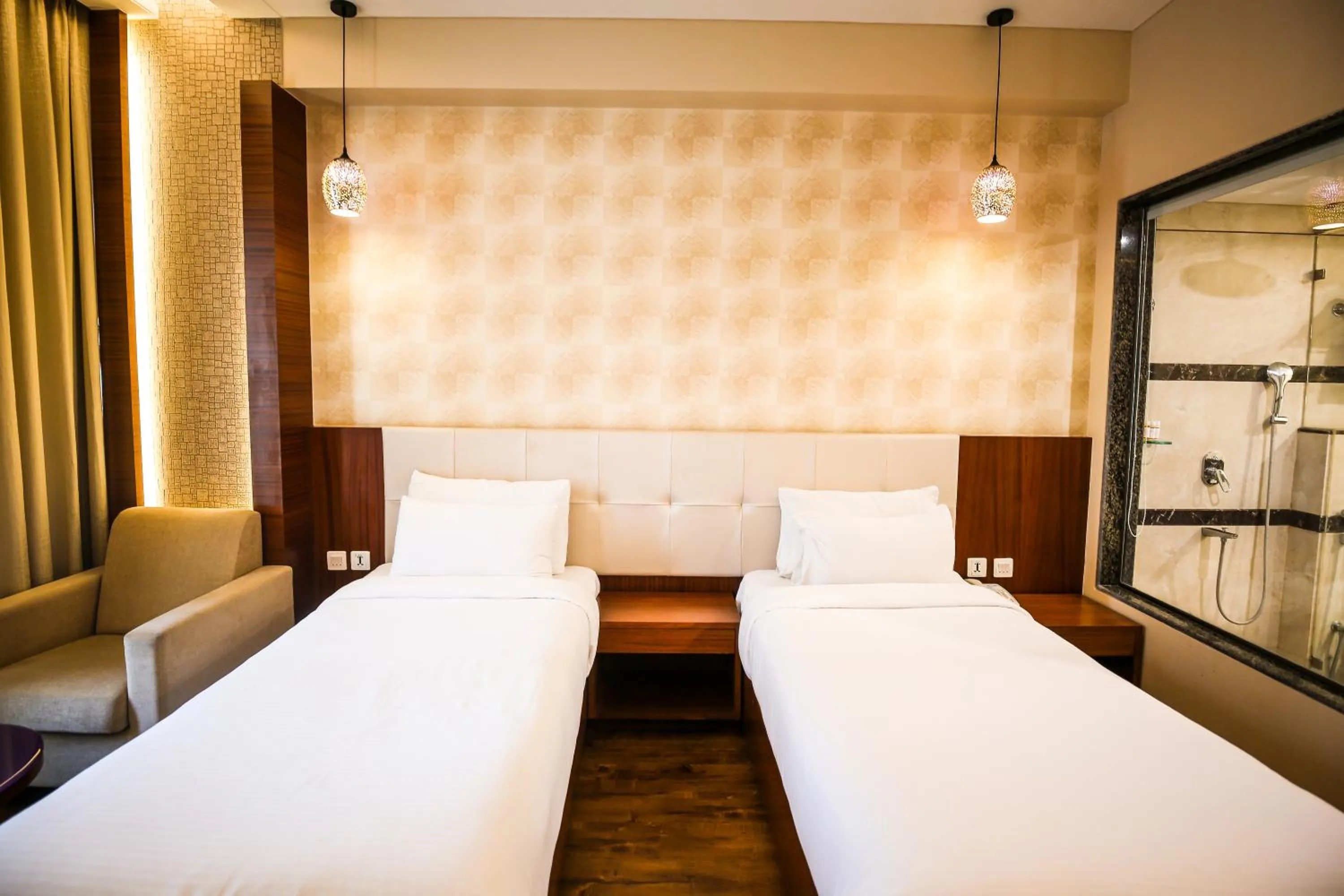 Bed in Pristine Hotel, Varanasi