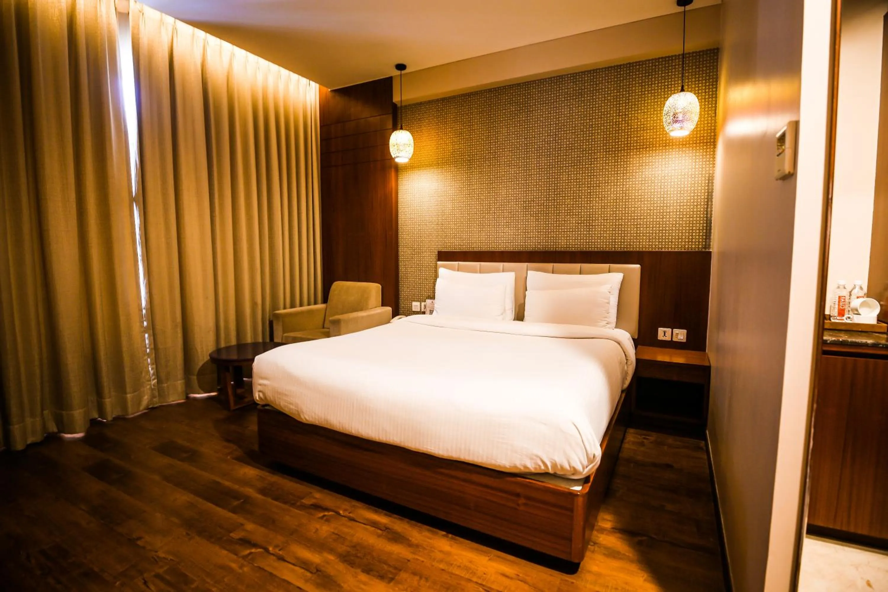 Bed in Pristine Hotel, Varanasi