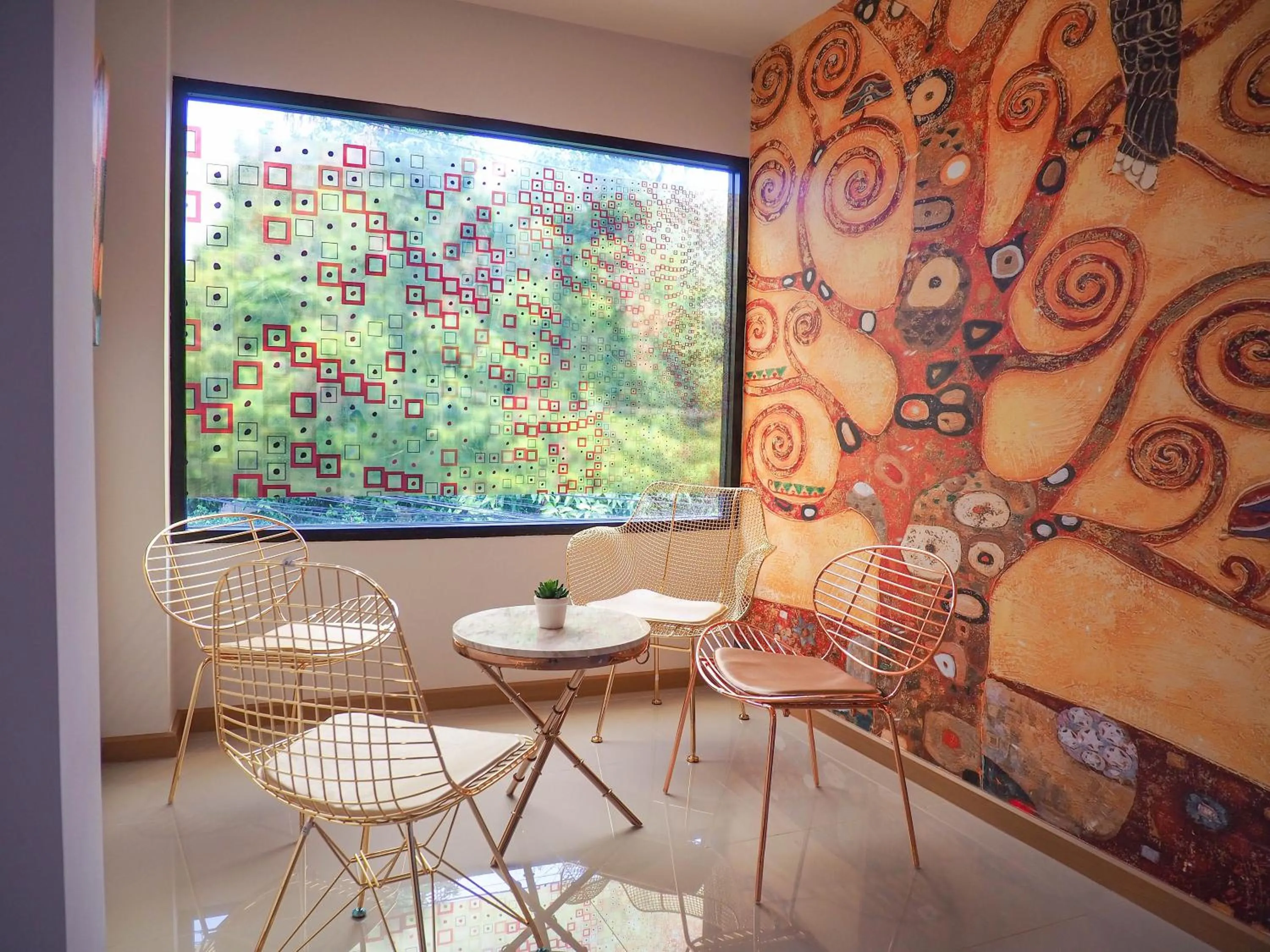 Seating area in Malee Hotel