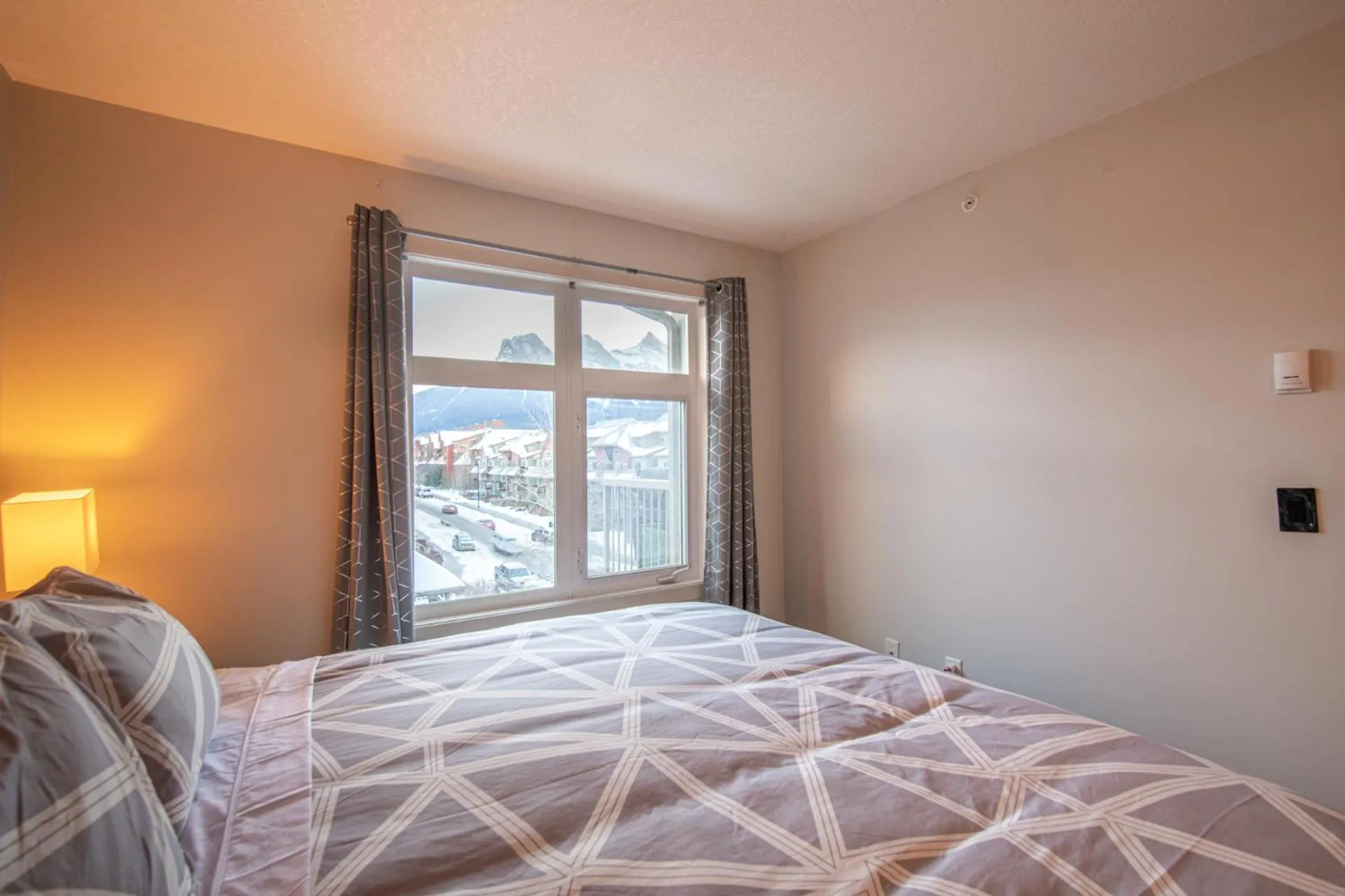 Bed in Top Floor Condo - 2BR & AC with Mountain Views