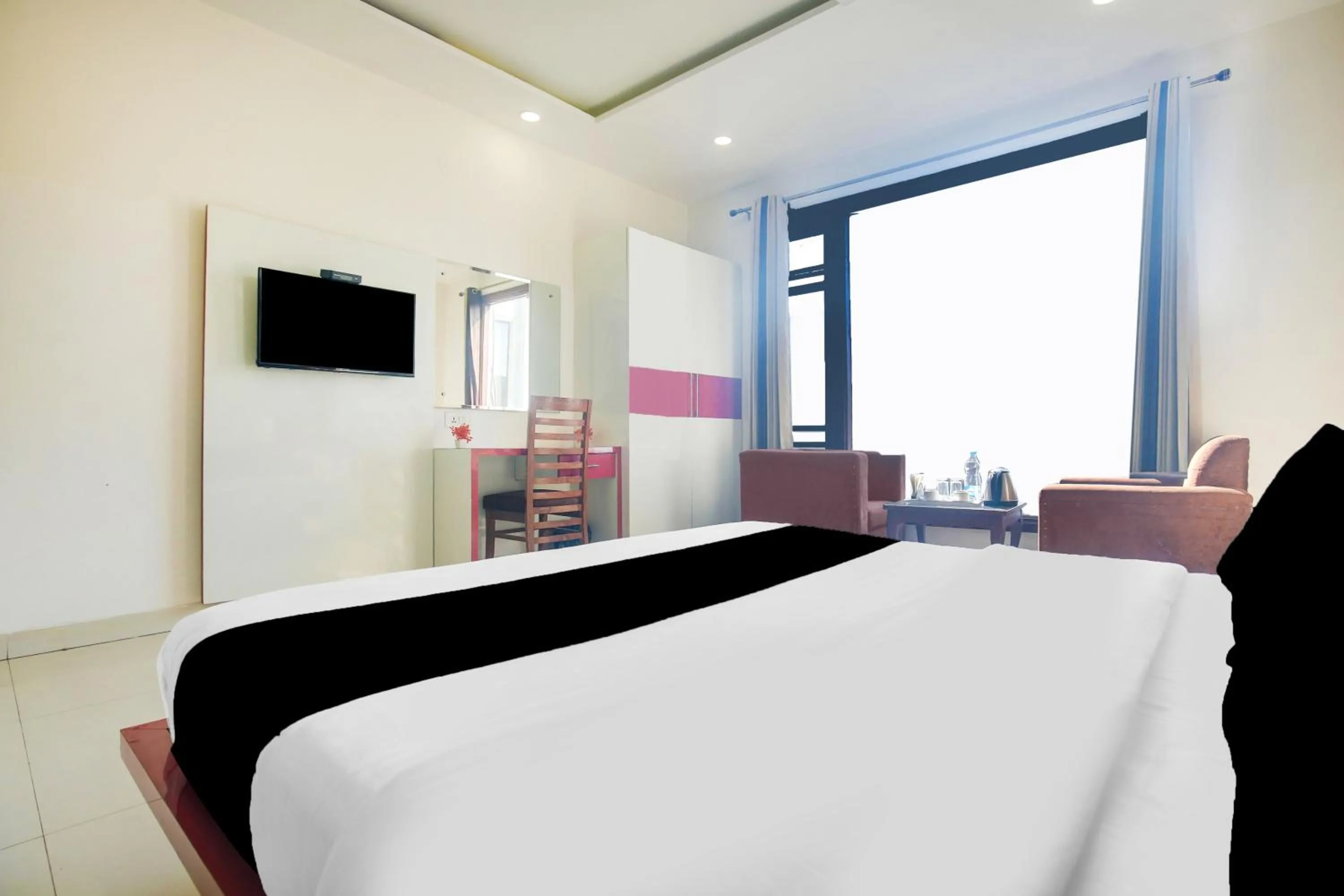 Bedroom, Bed in FabHotel Golden Home