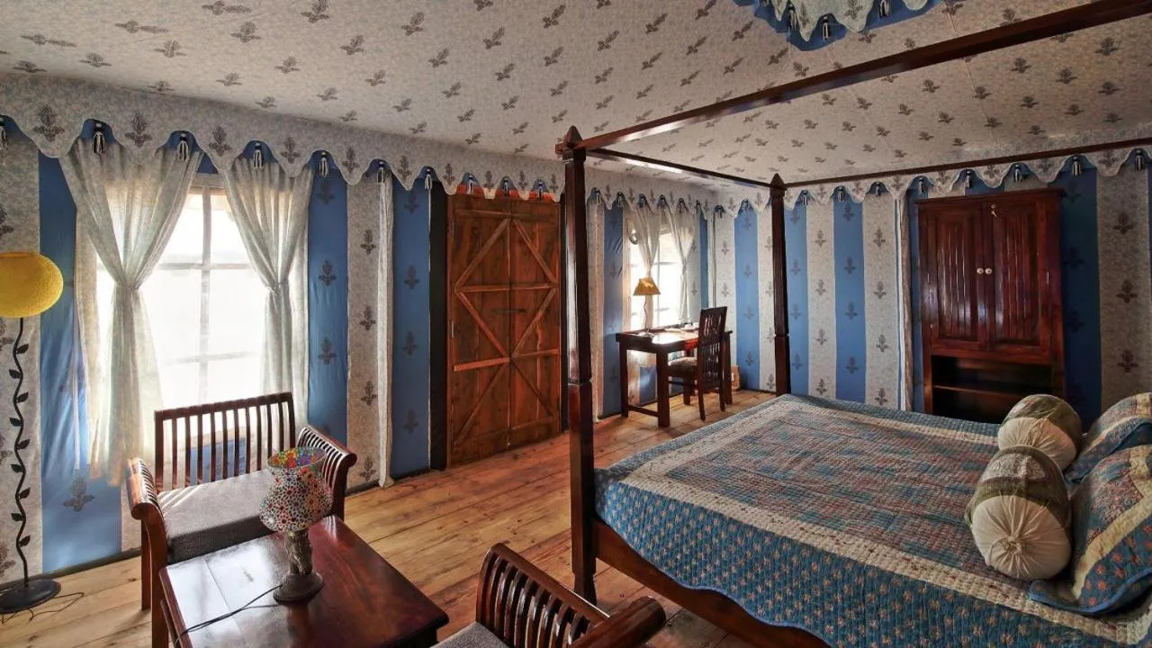 Photo of the whole room, Bed in Maa Ashapura Resort