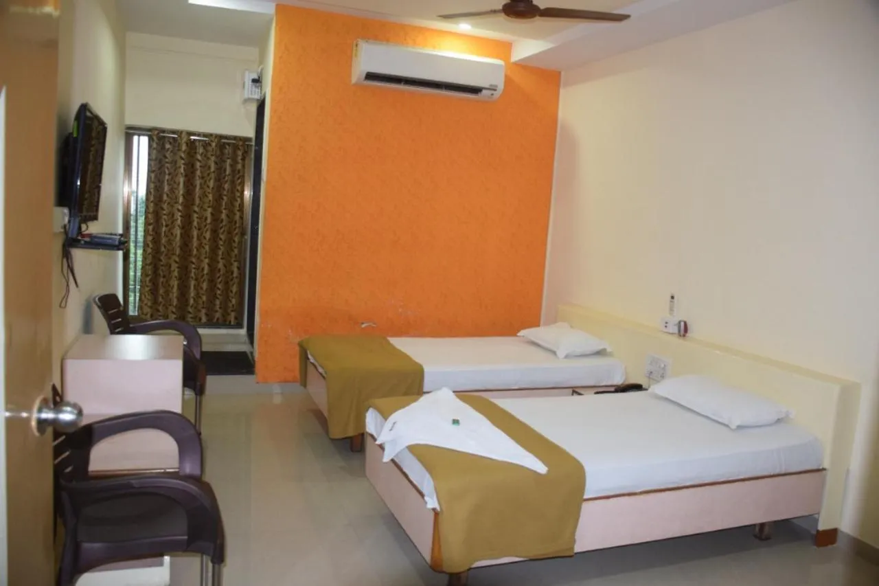 Bedroom, Bed in Hotel Uma Executive Lodging