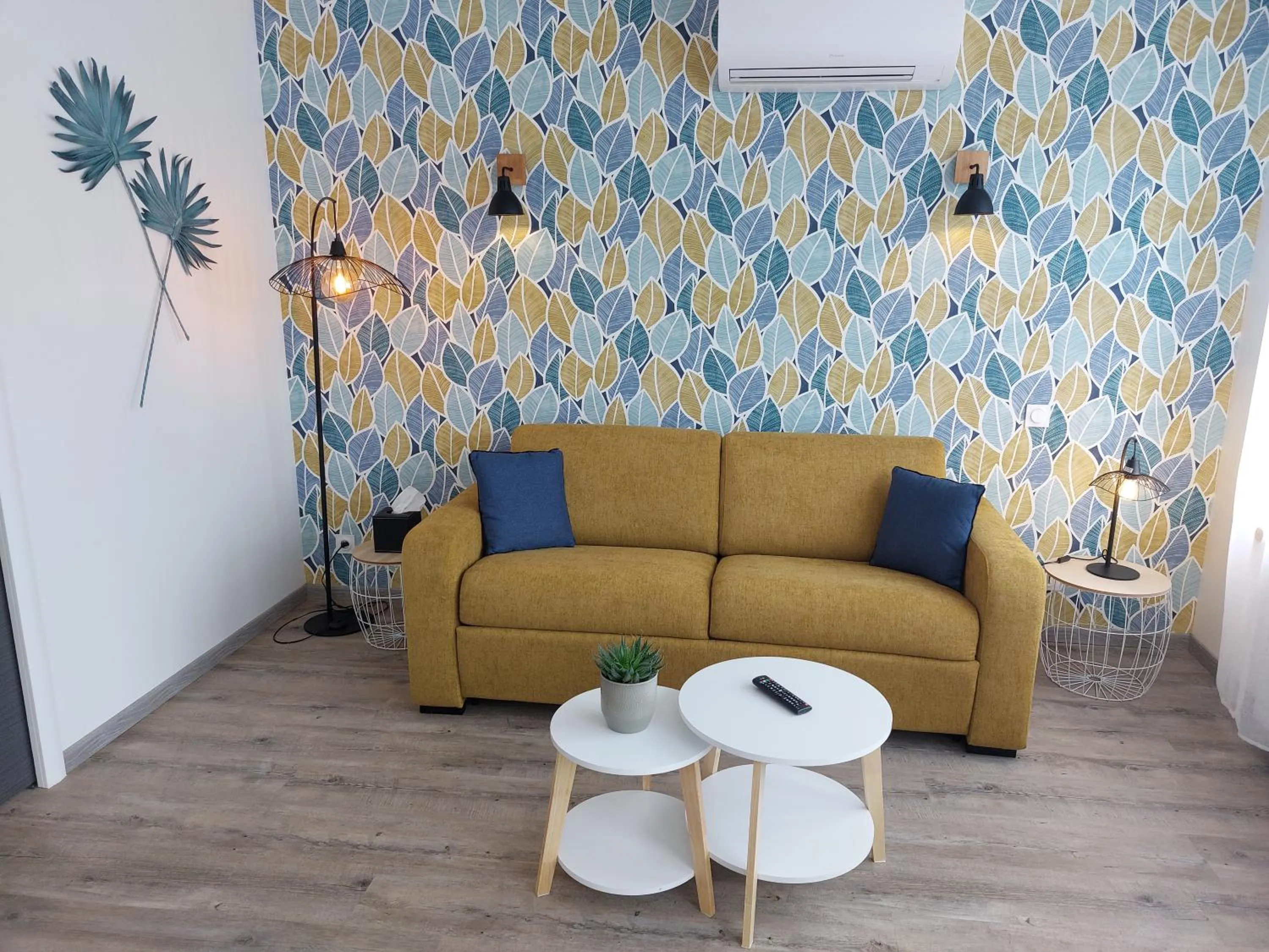 Seating area in Logis Loire Hotel - Les Cocottes Restaurant