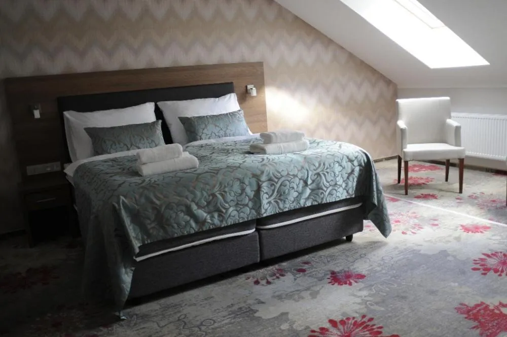 Bed in Hotel Prague Star