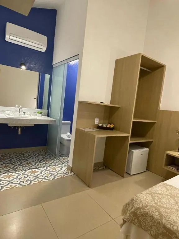 Bed in Pousada Relicário