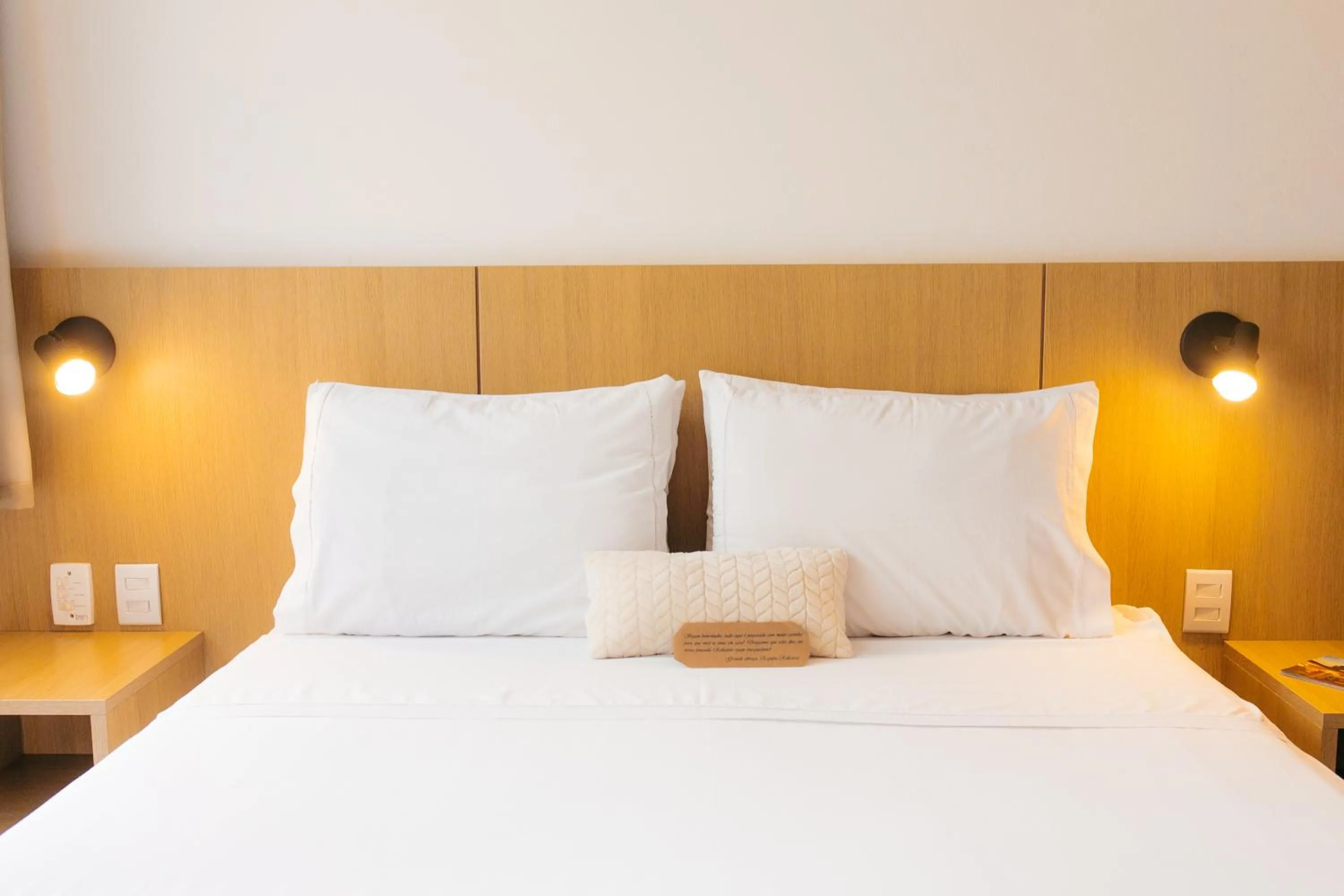 Bed in Pousada Relicário