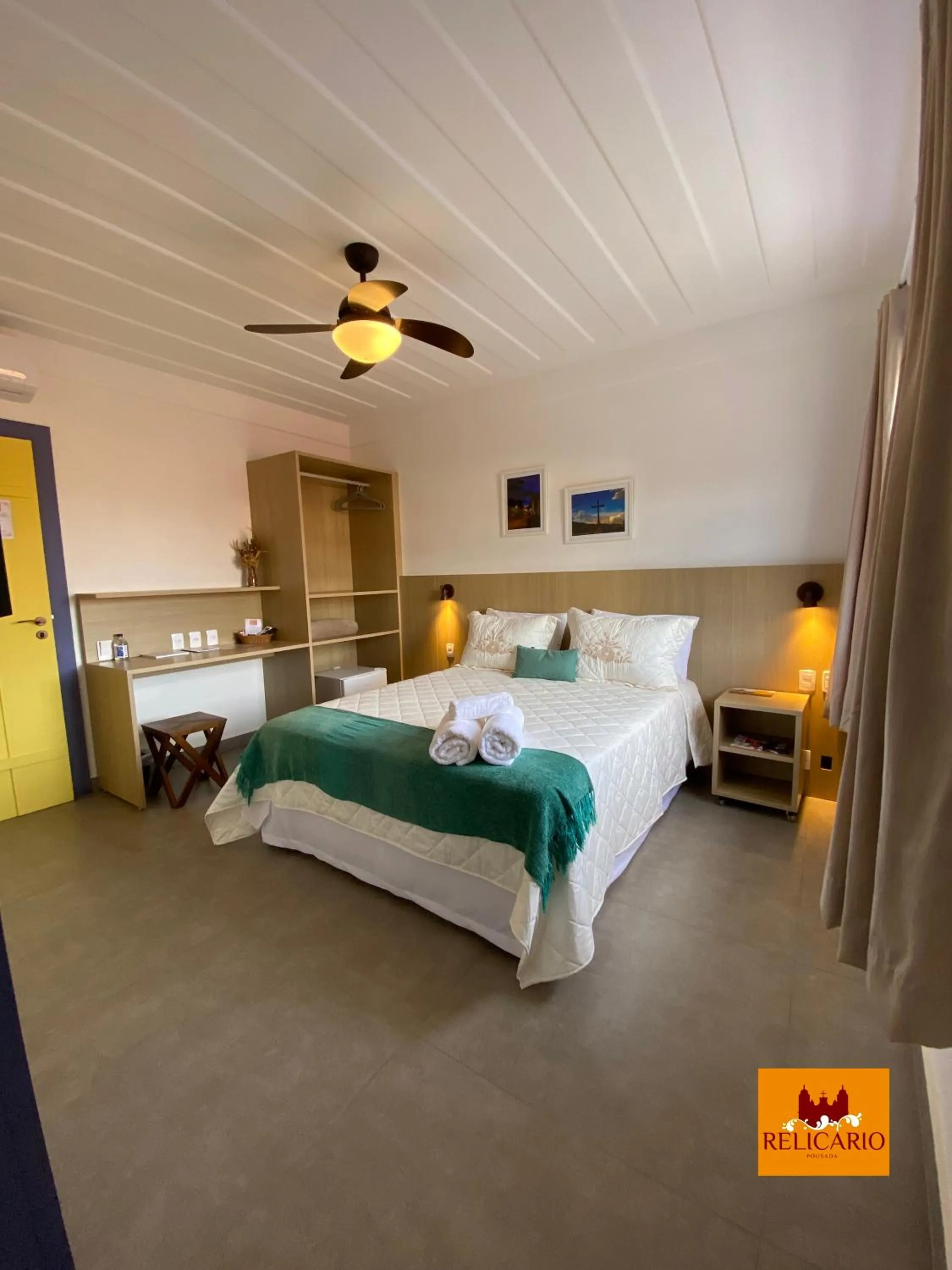 Bed in Pousada Relicário