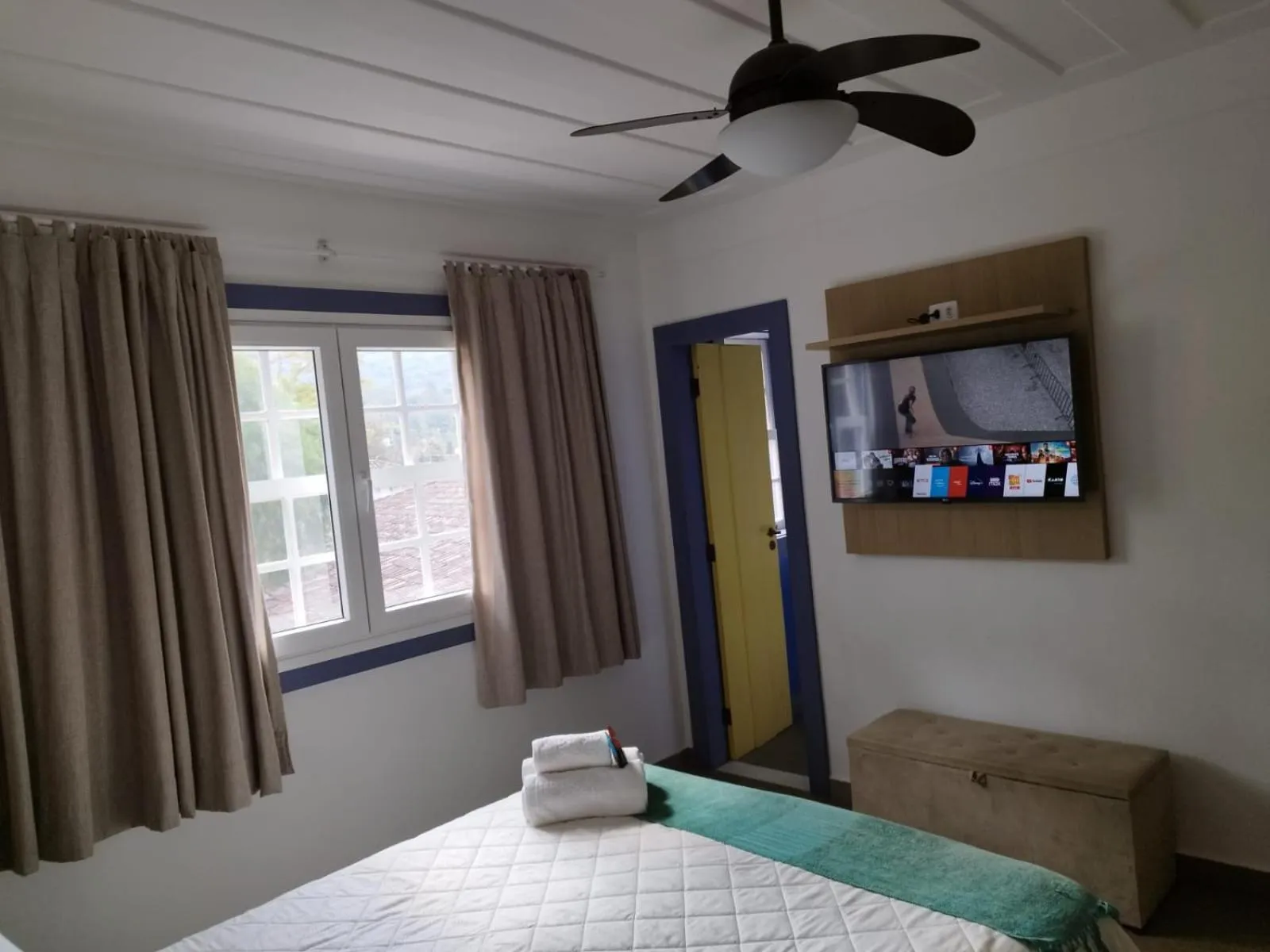 Bed in Pousada Relicário