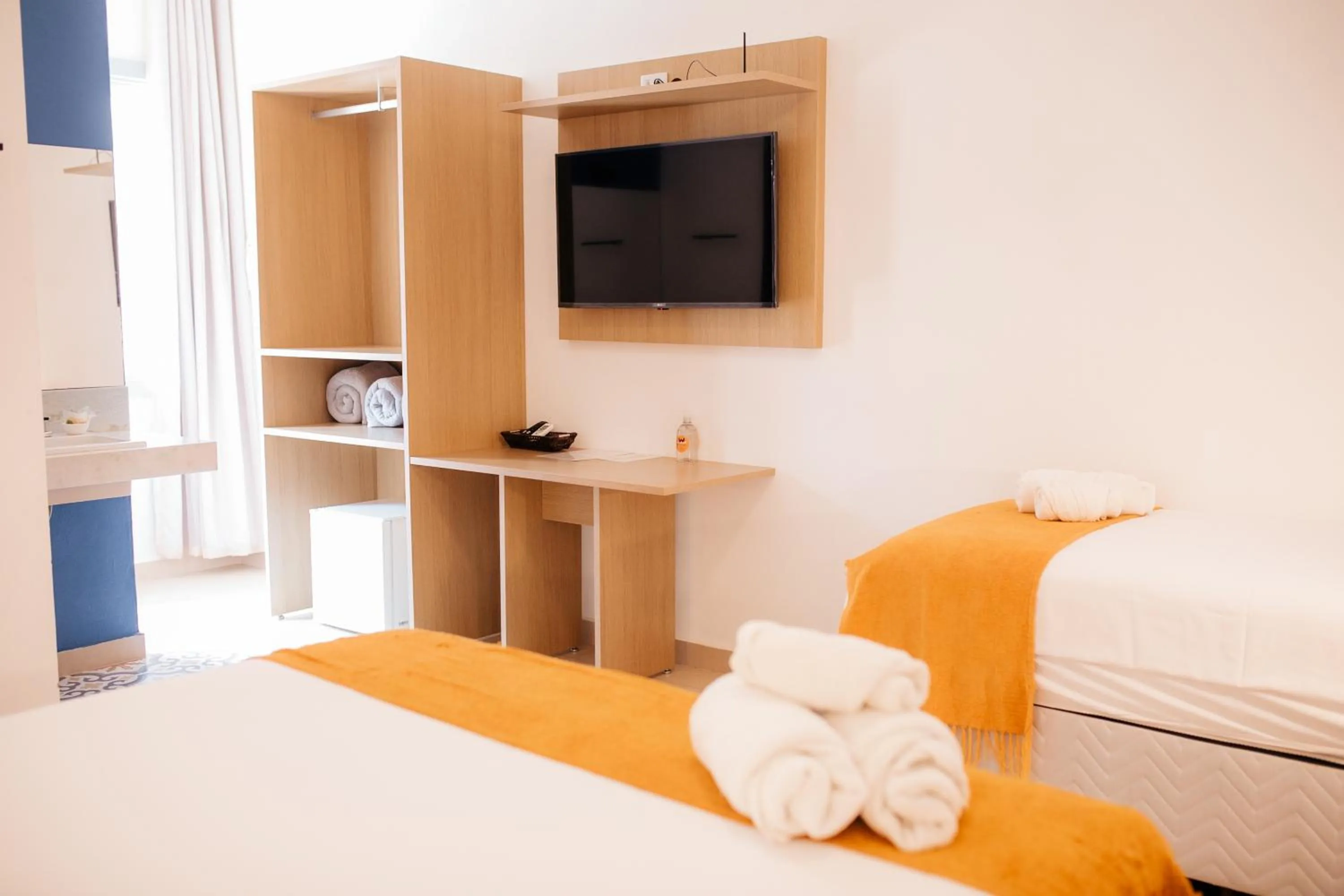 Bed in Pousada Relicário