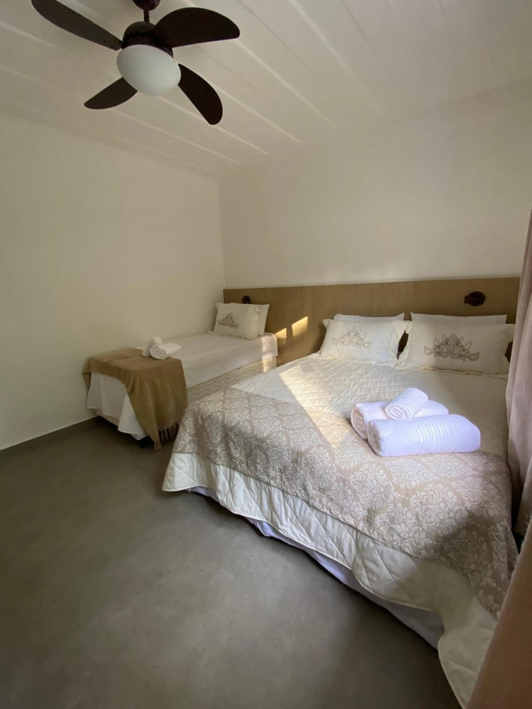 Bed in Pousada Relicário