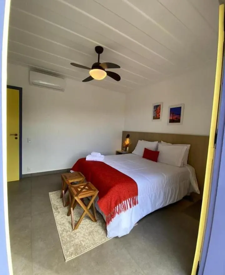 Bed in Pousada Relicário