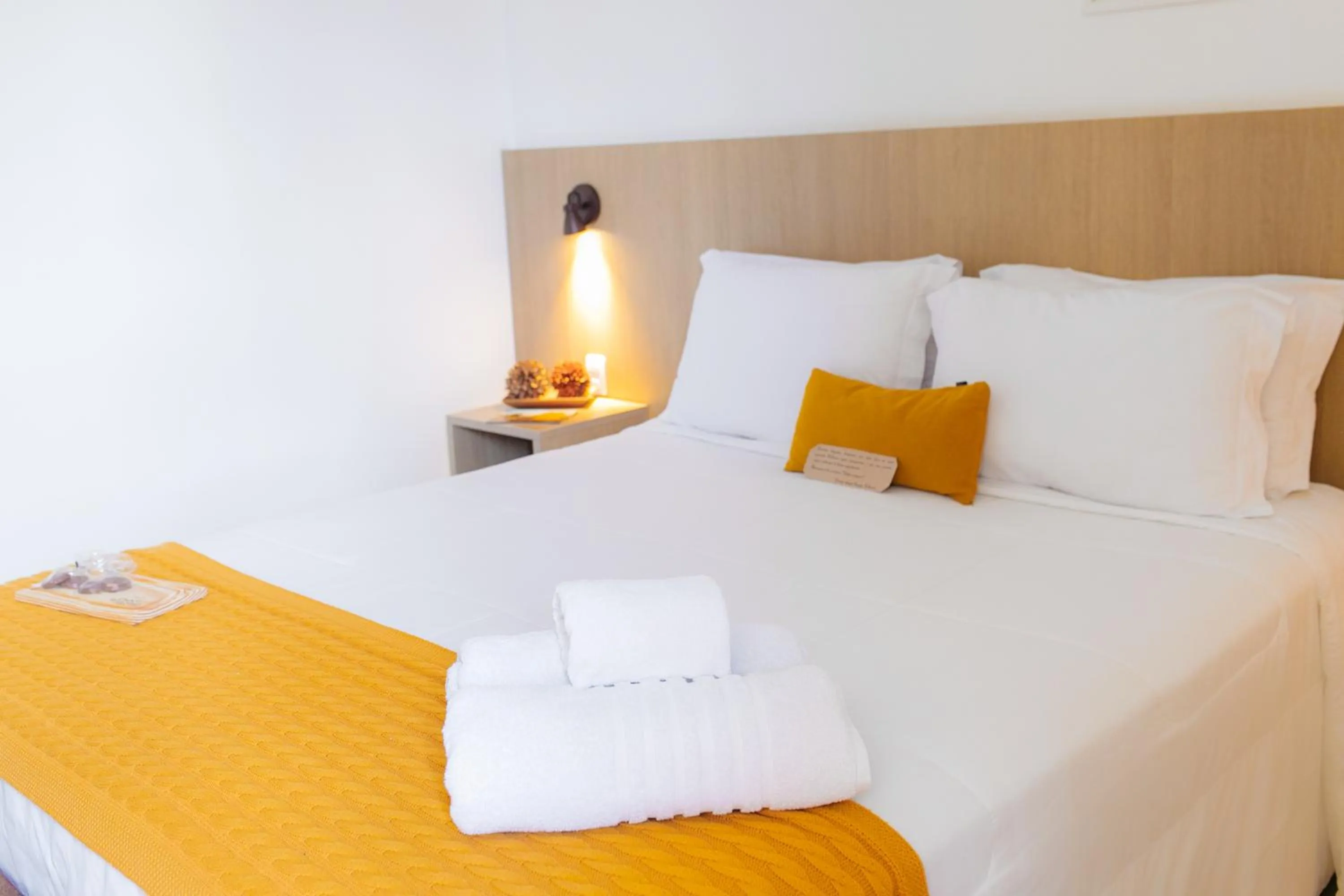 Bed in Pousada Relicário