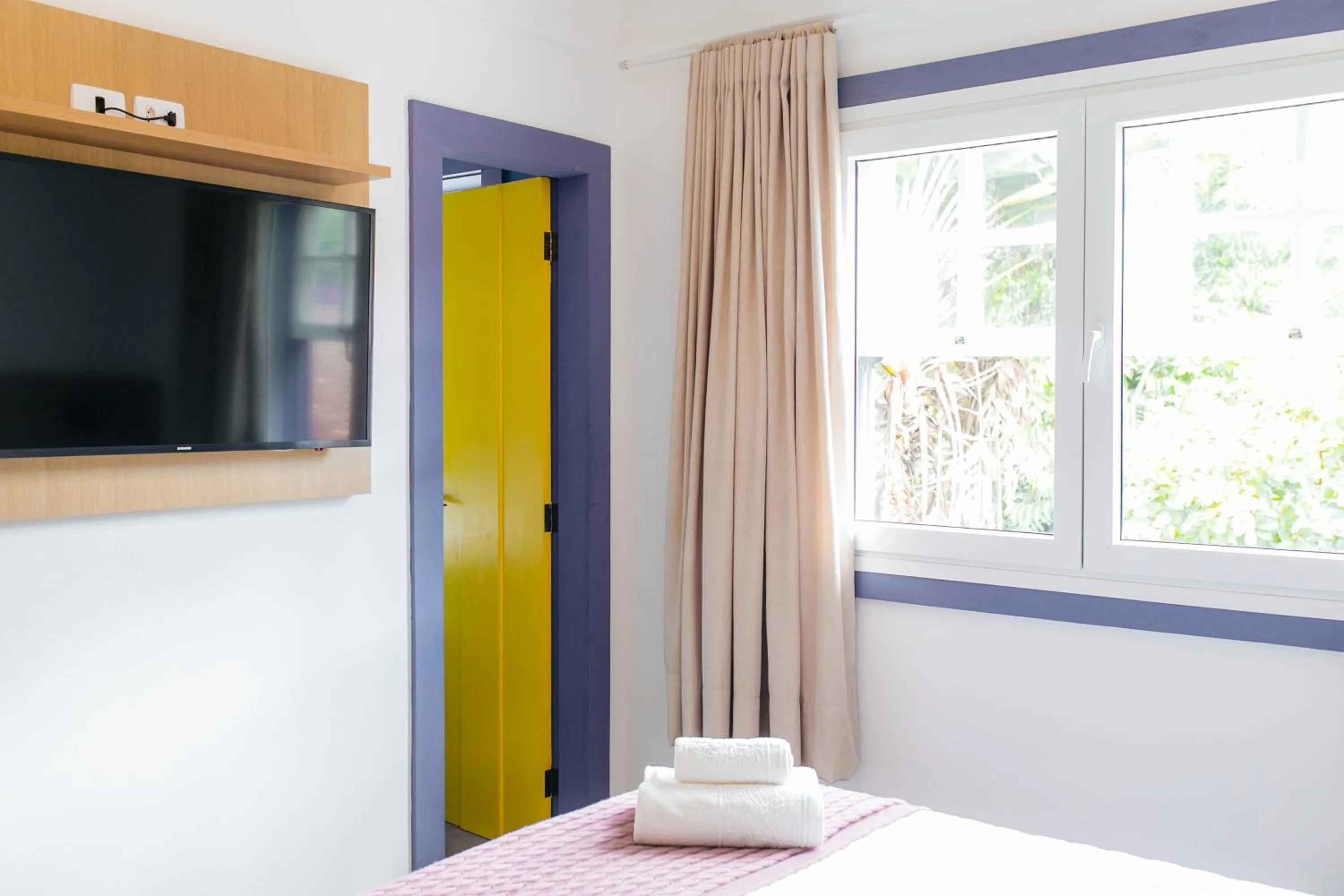 Bed in Pousada Relicário