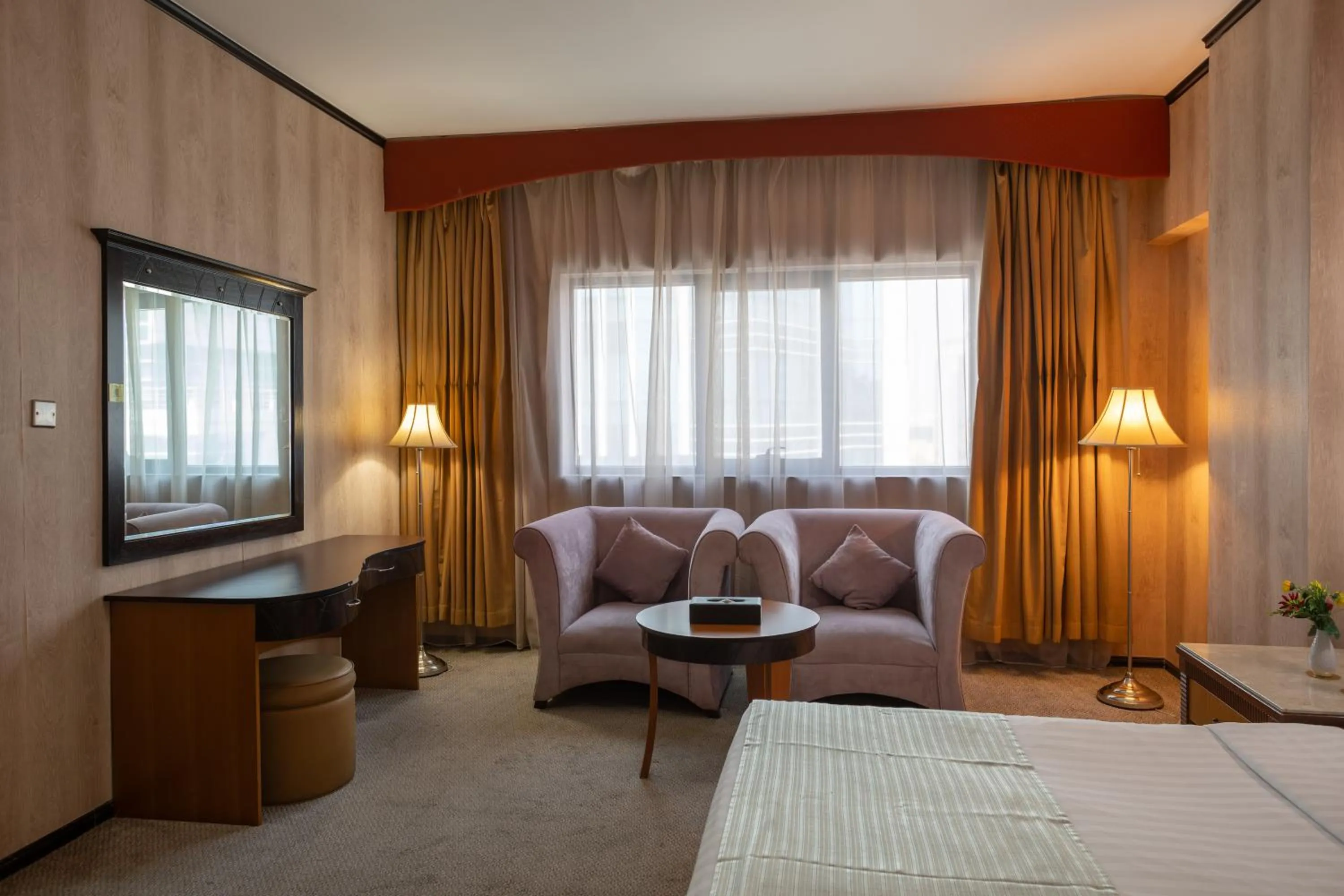 Seating area, Bed in THE PARK HOTEL Formerly Al Jawhara Gardens