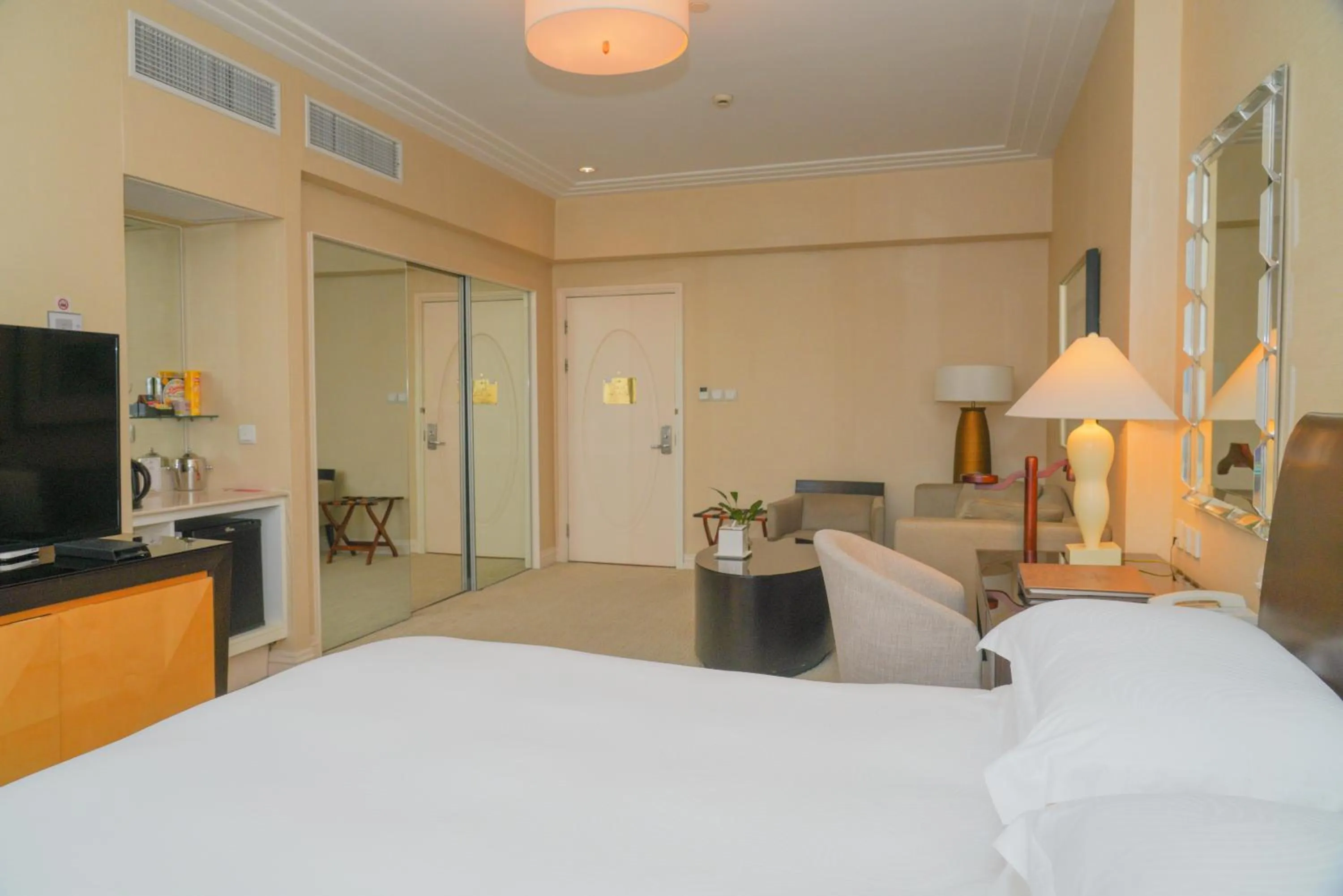 Photo of the whole room, Bed in Broadway Mansions Hotel - On the Bund - Journey Through Time Old Shanghai Republic Dreams