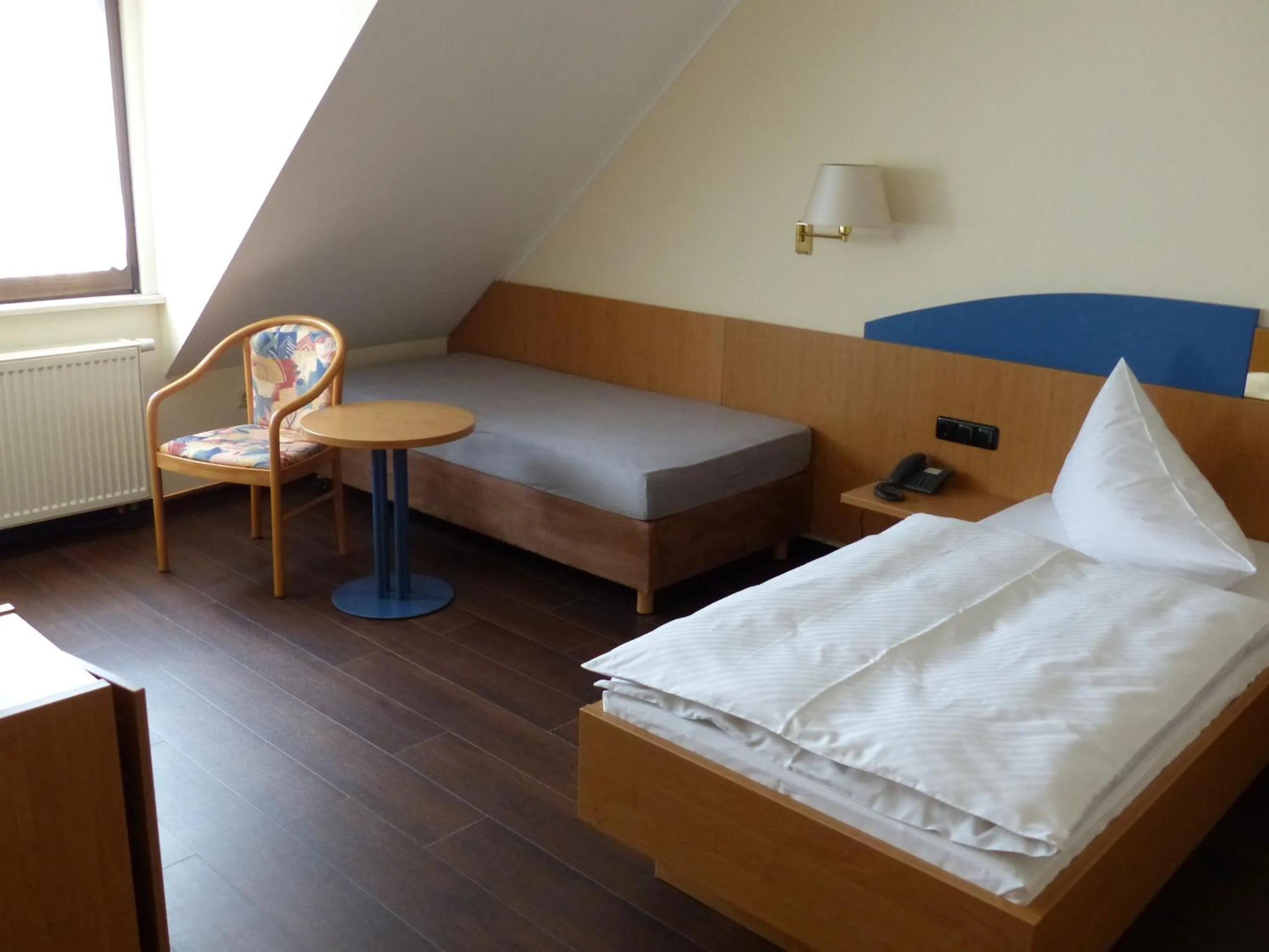 Photo of the whole room, Bed in Hotel Zum Anger