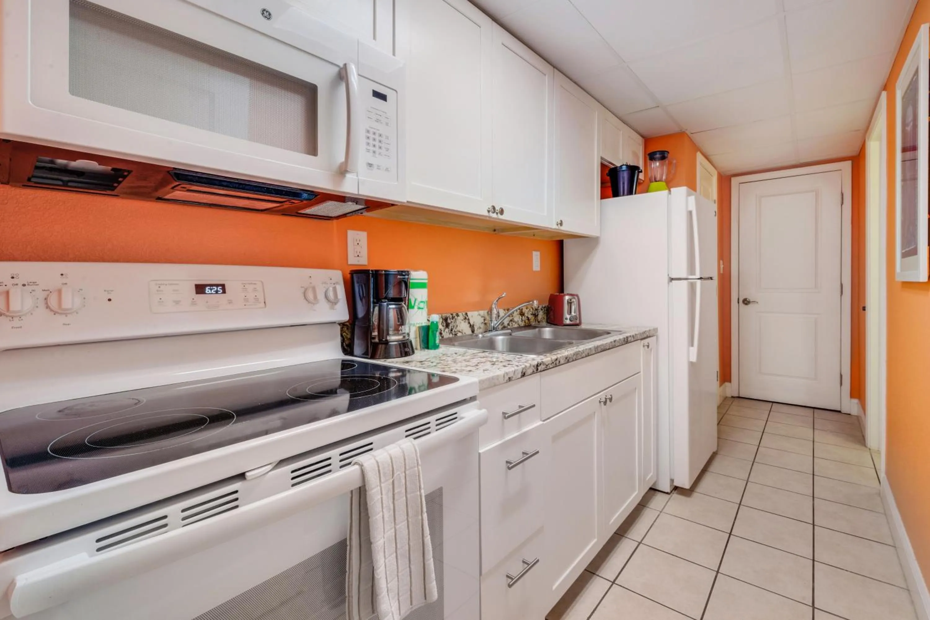 Kitchen or kitchenette in Direct oceanfront, separate bedroom condo, 9th floor, unbelievable views!