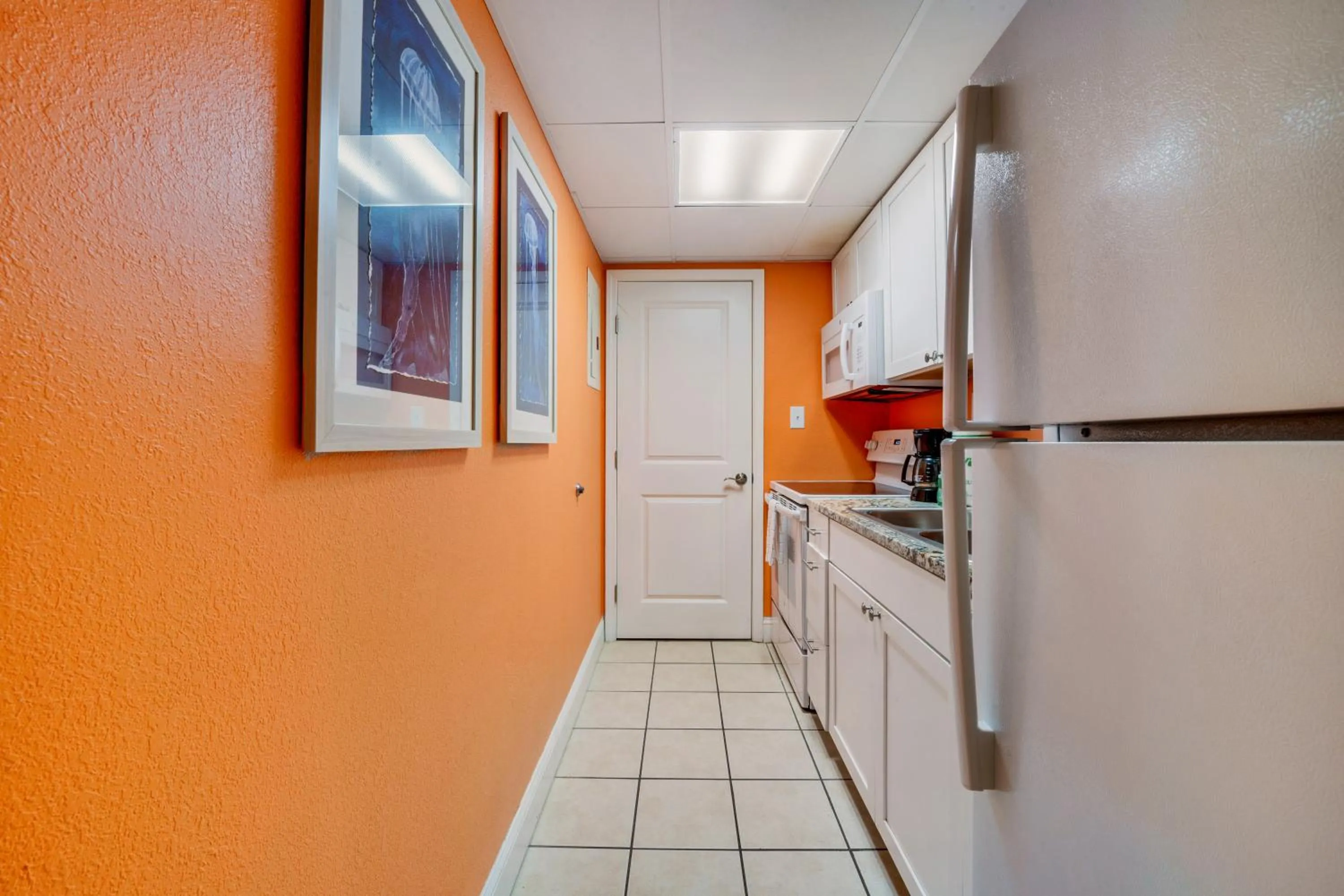 Kitchen or kitchenette in Direct oceanfront, separate bedroom condo, 9th floor, unbelievable views!