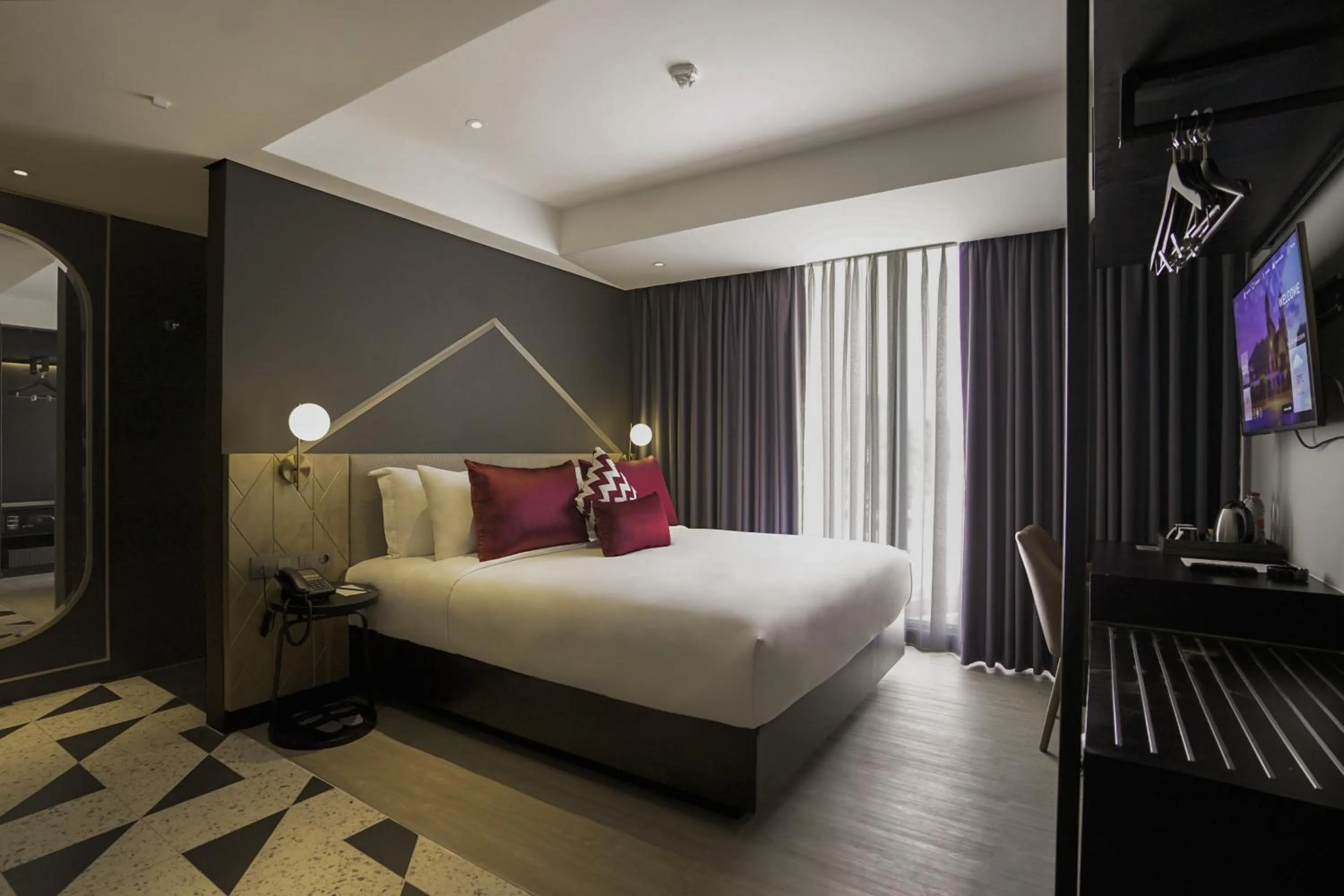 Bed in Awann Sewu Boutique Hotel and Suite Semarang