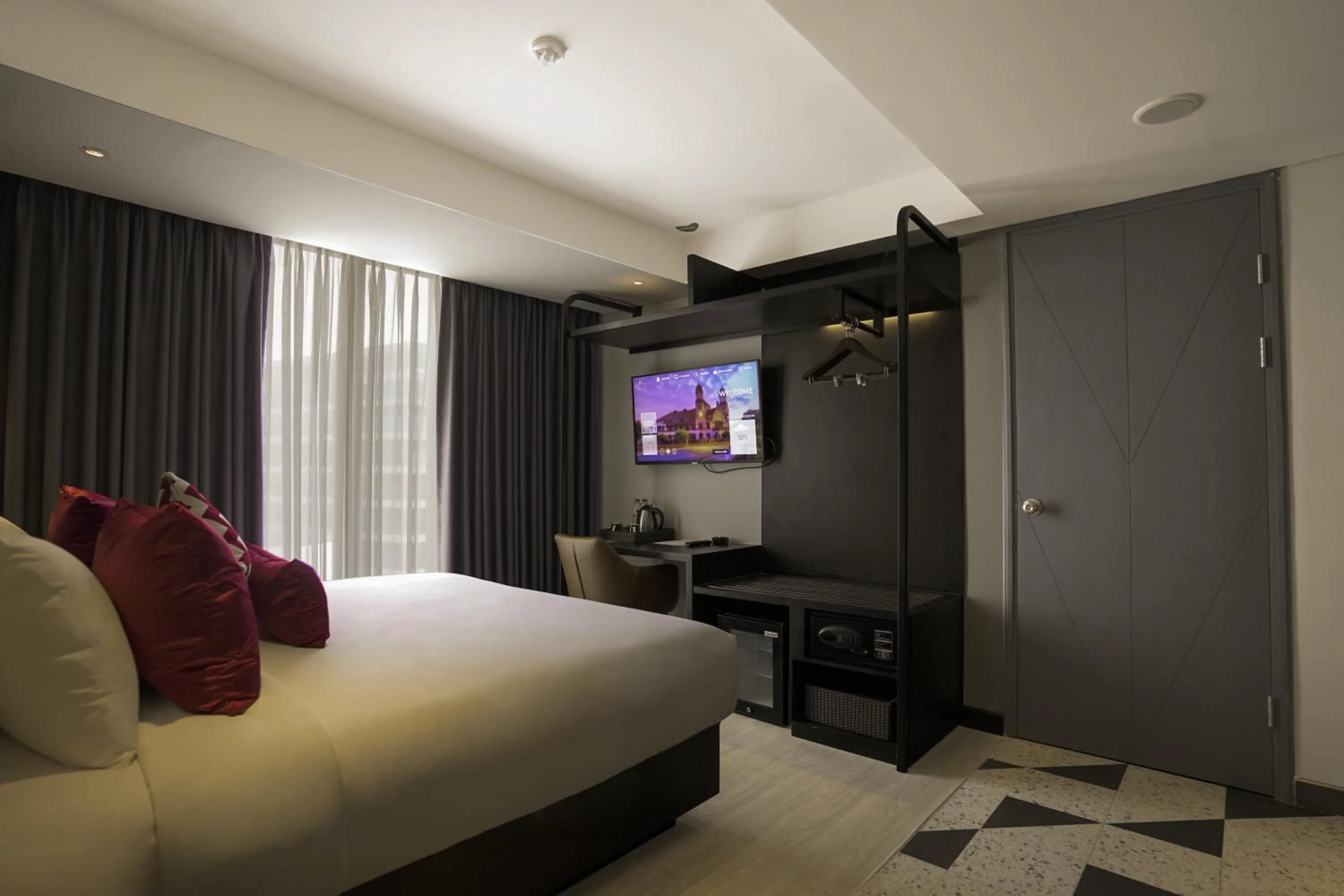 Bed in Awann Sewu Boutique Hotel and Suite Semarang