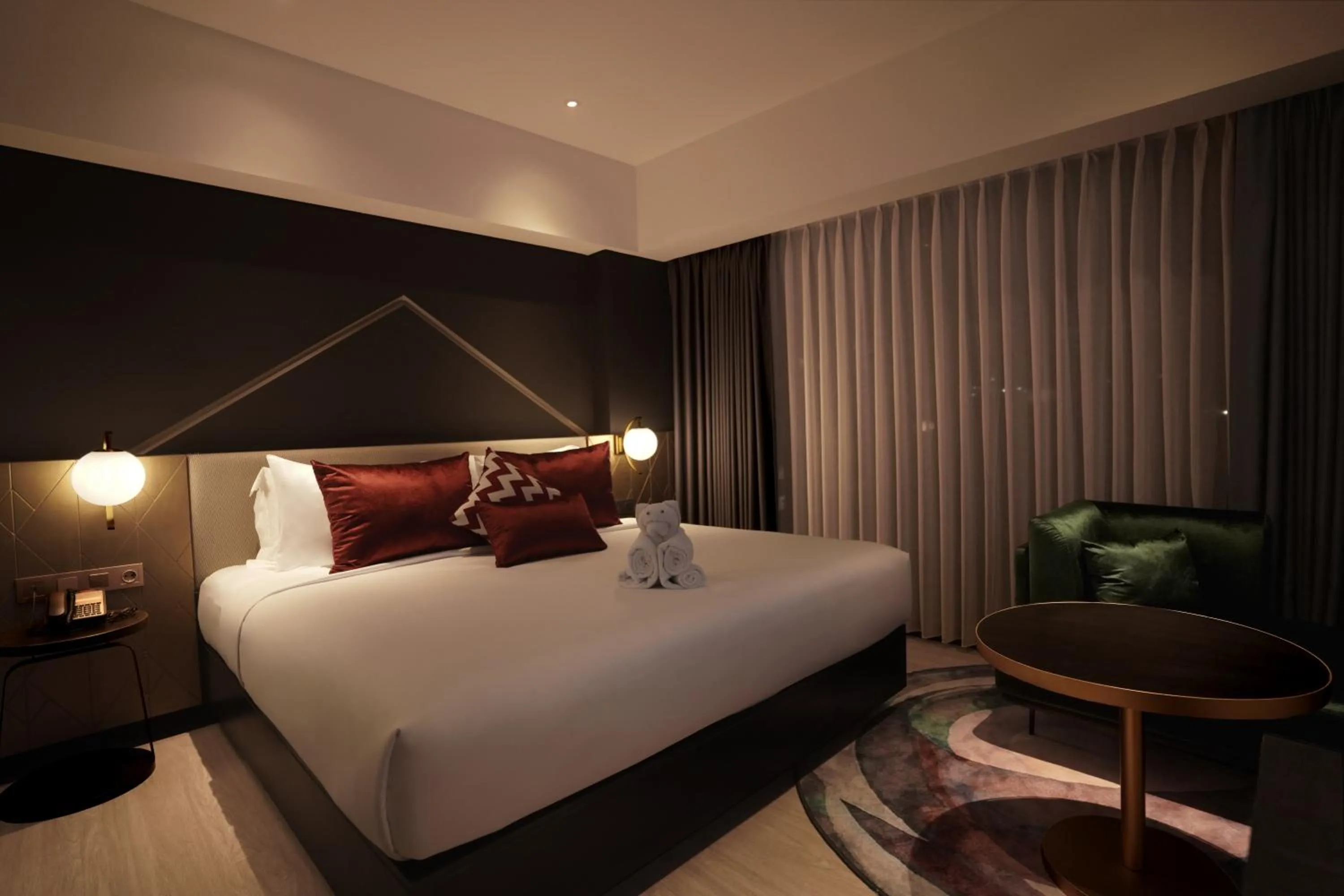 Bed in Awann Sewu Boutique Hotel and Suite Semarang