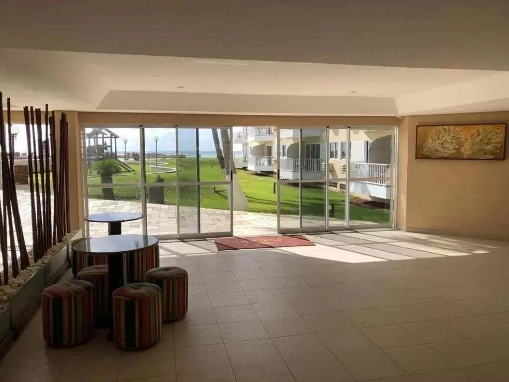 Lobby or reception in Muro Alto Marupiara Suítes