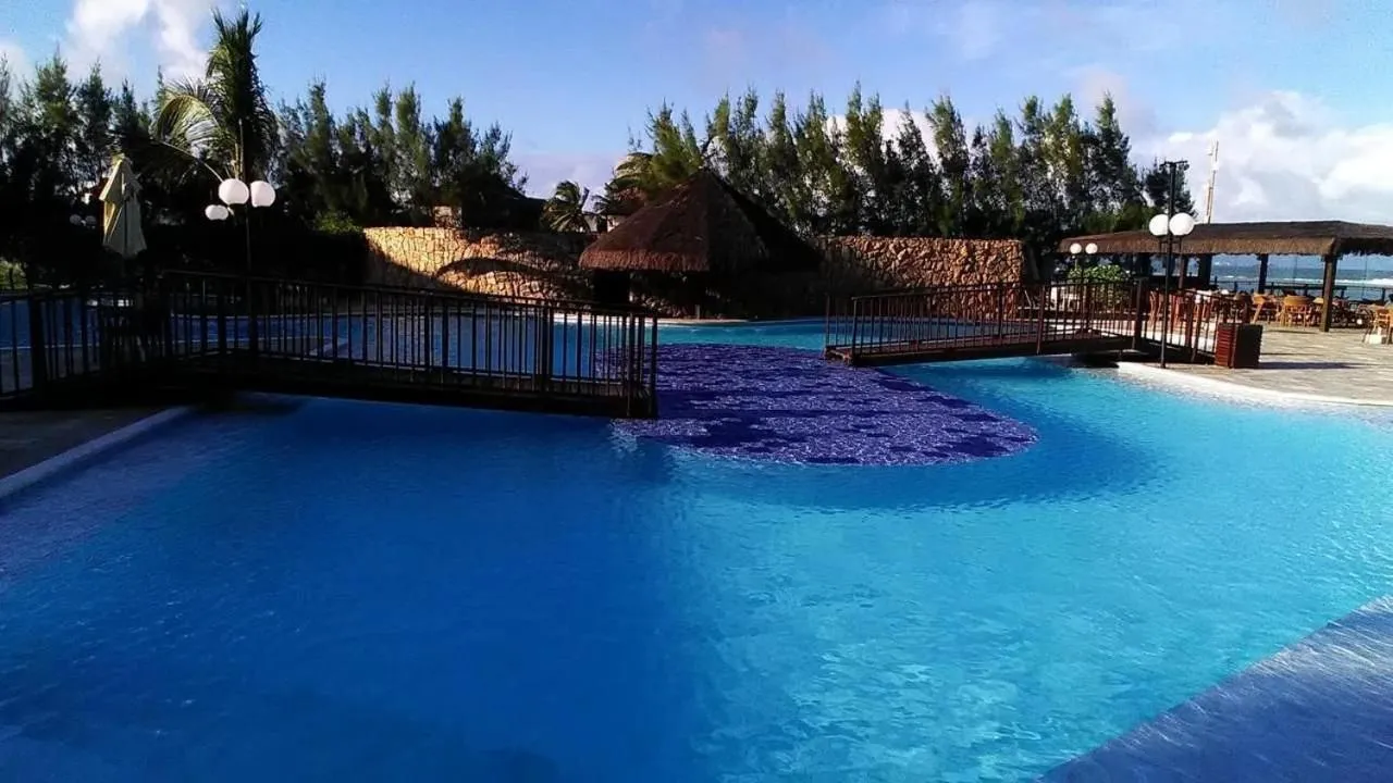 Swimming pool in Muro Alto Marupiara Suítes