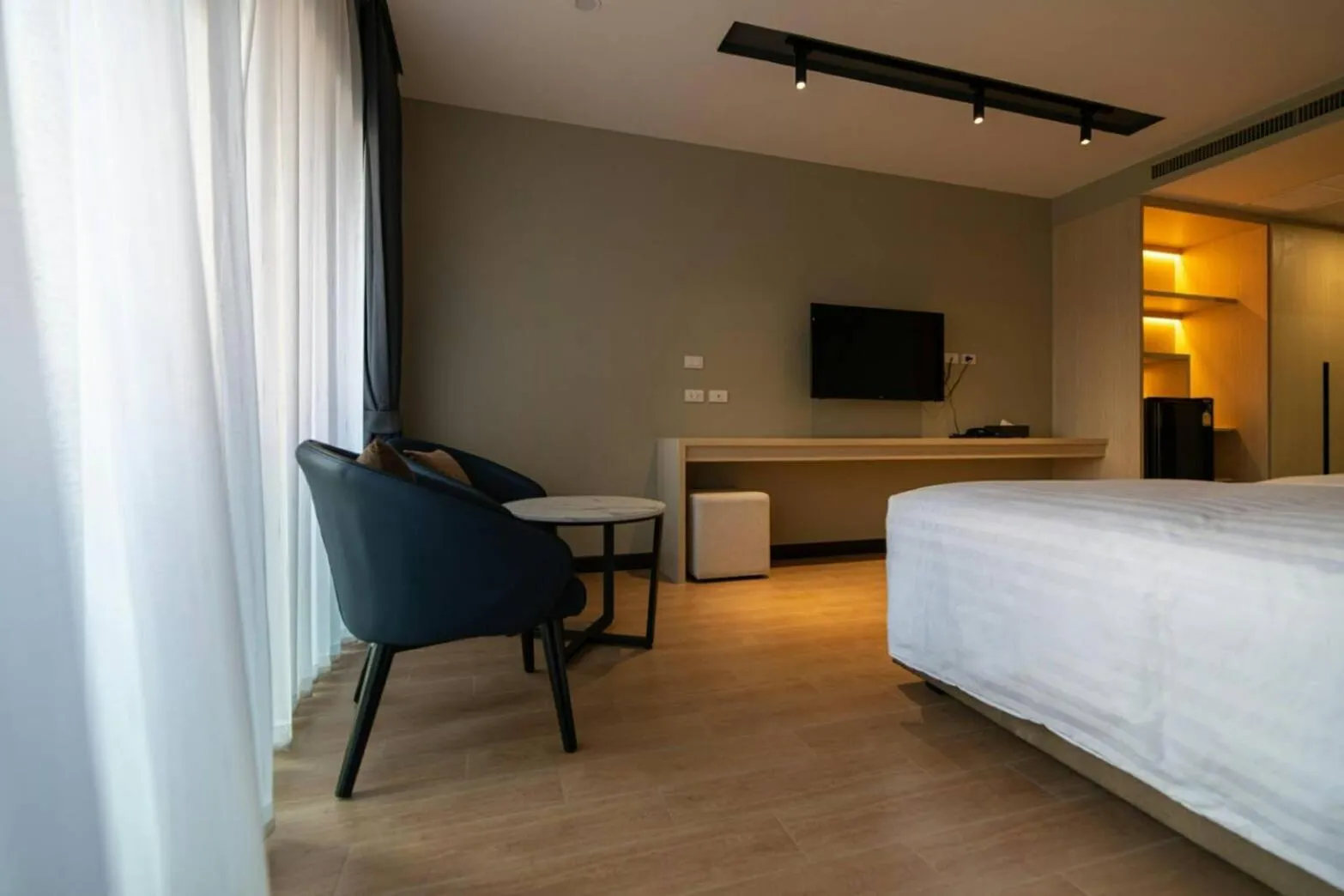 Bed in Lewit Hotel Pattaya, a member of Radisson Individuals