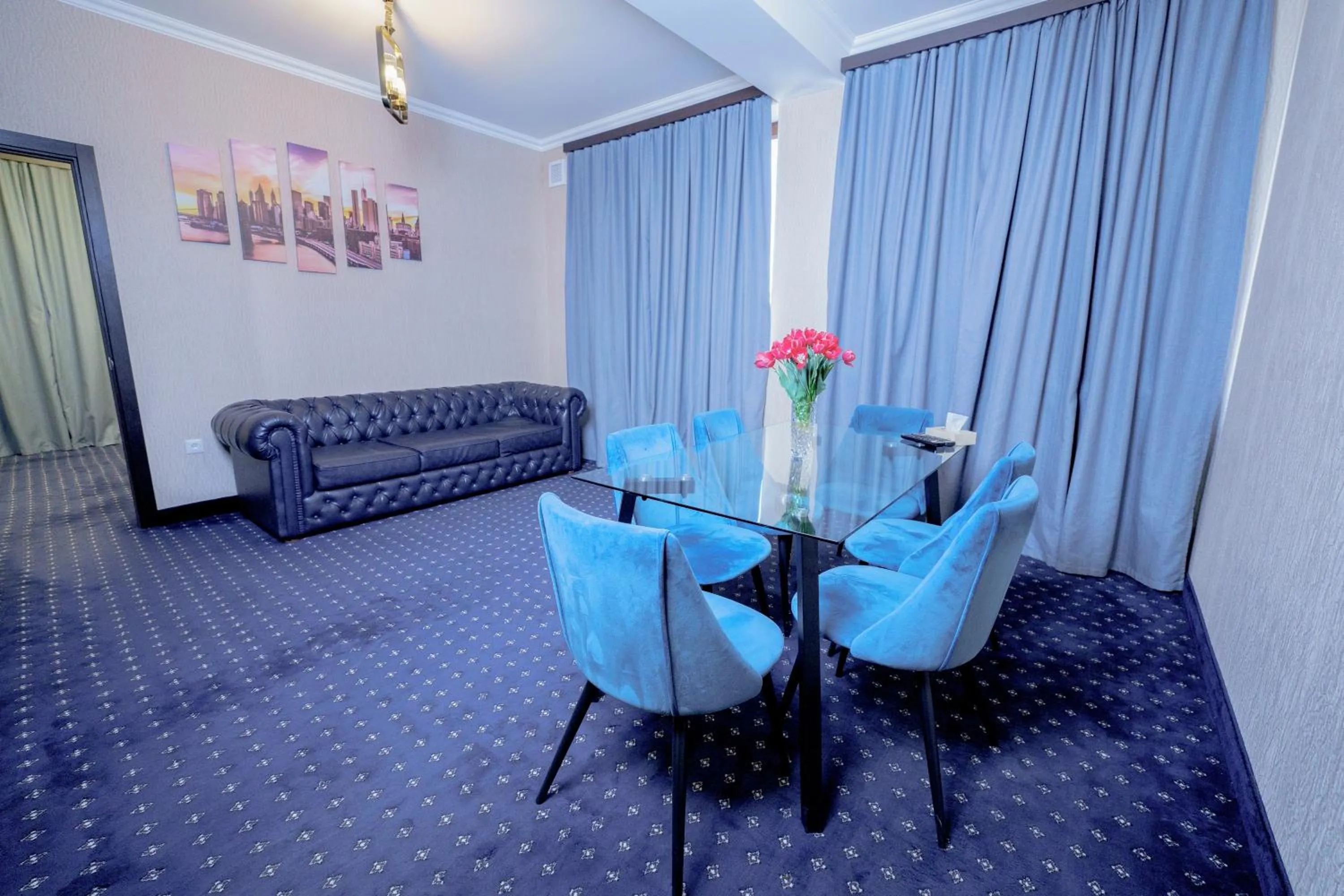 Living room in Welcome Inn Hotel