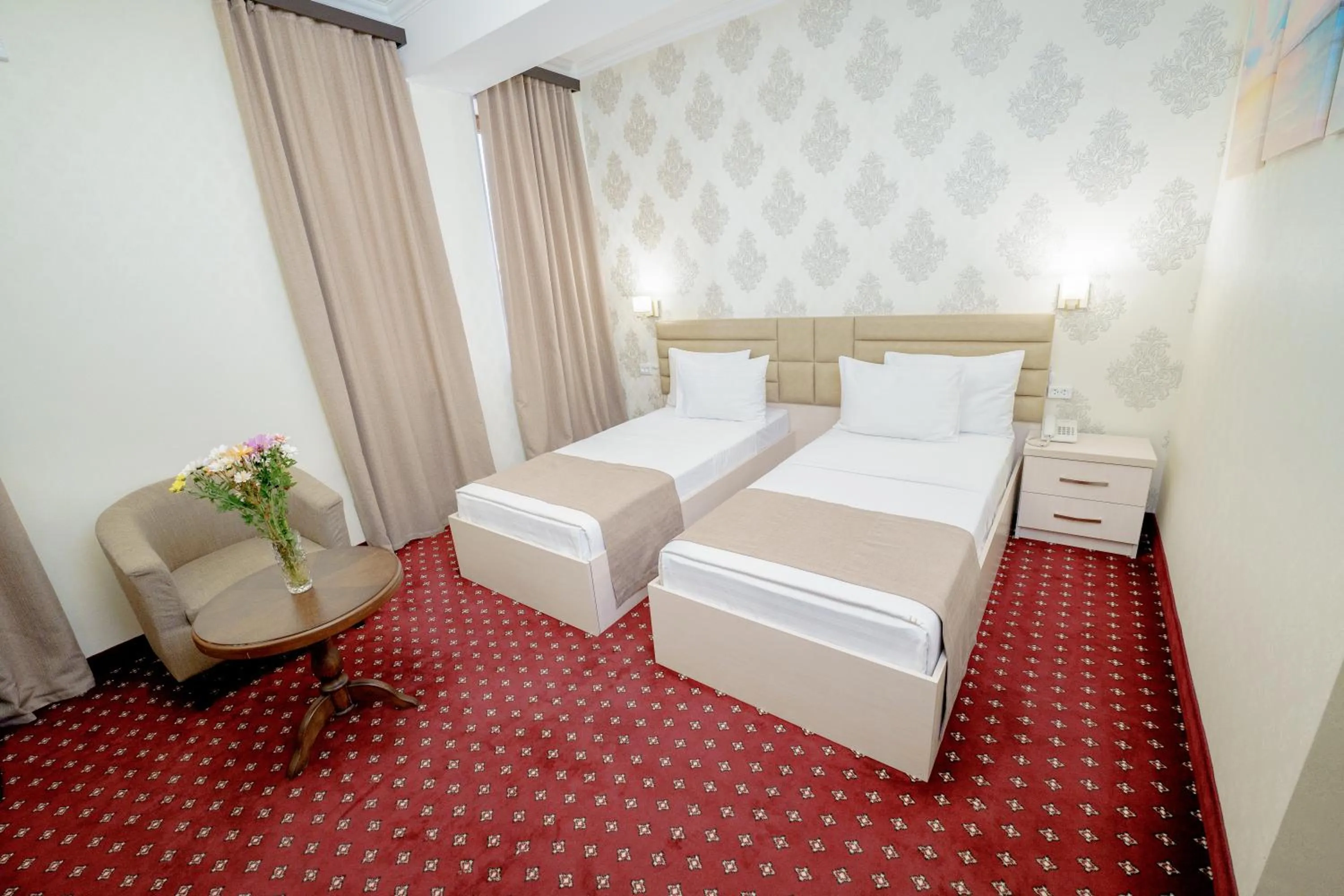 Bed in Welcome Inn Hotel