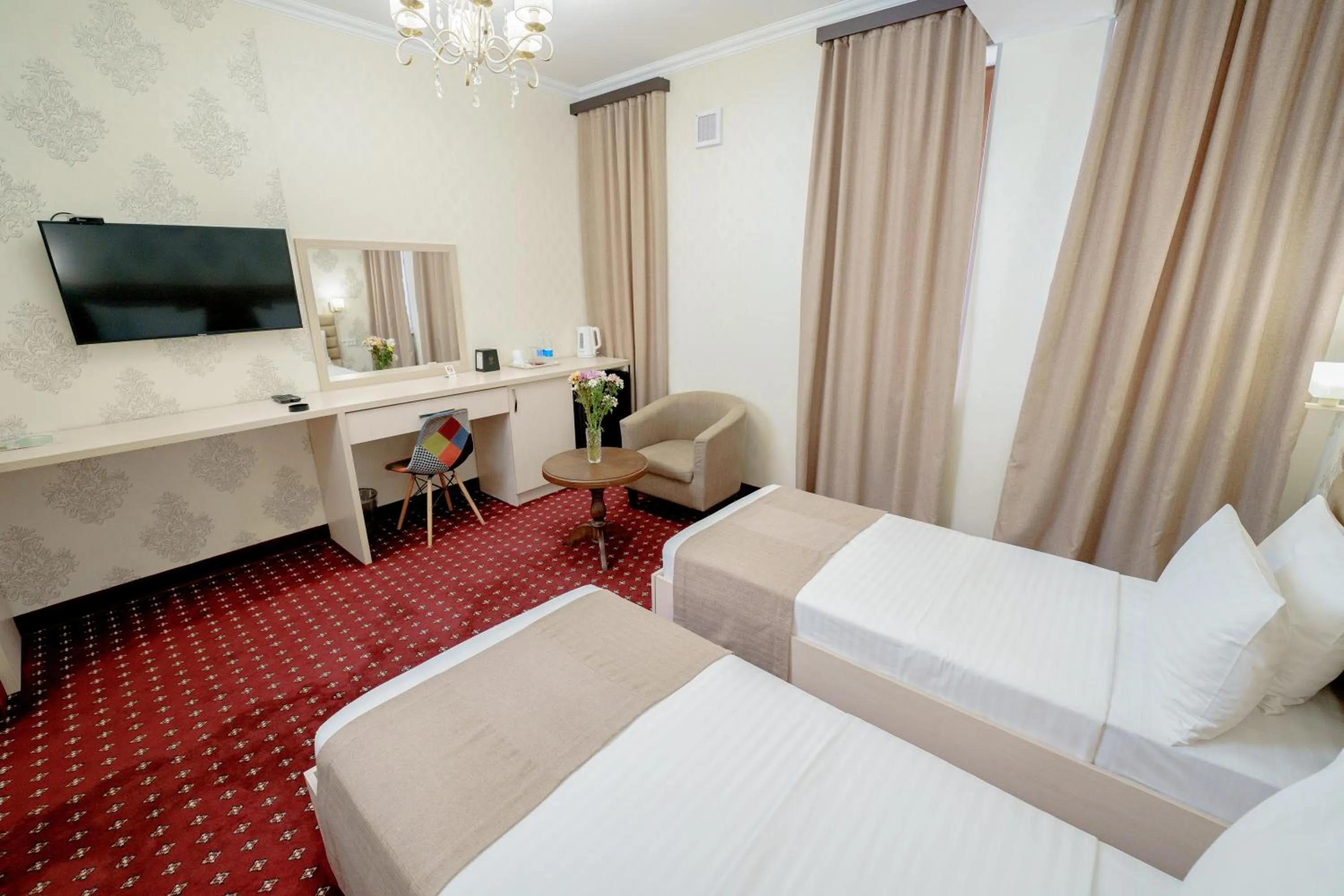 Bed in Welcome Inn Hotel