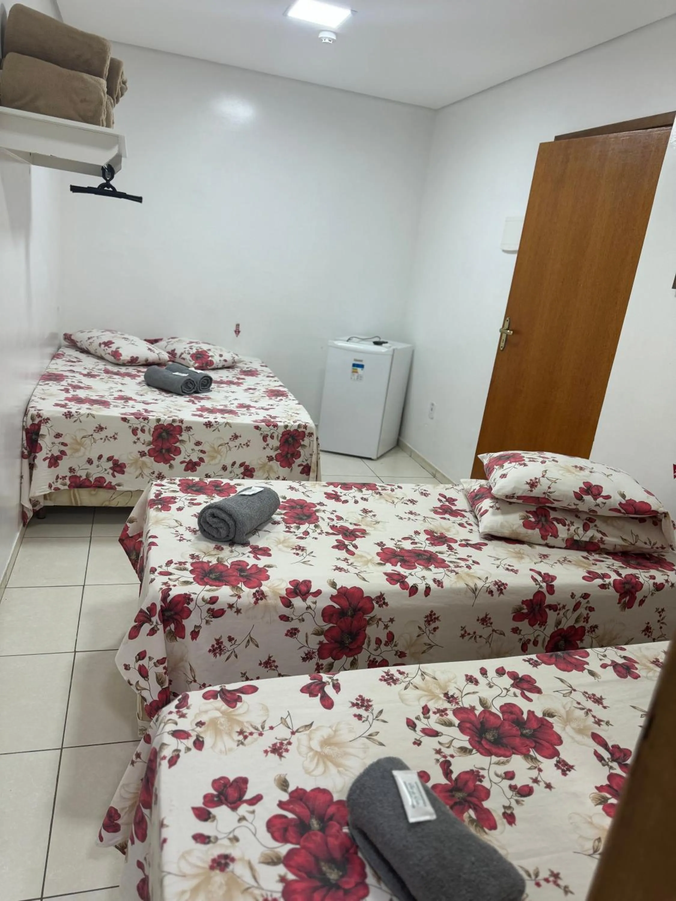 towels, Bed in Pousada Bella Vista