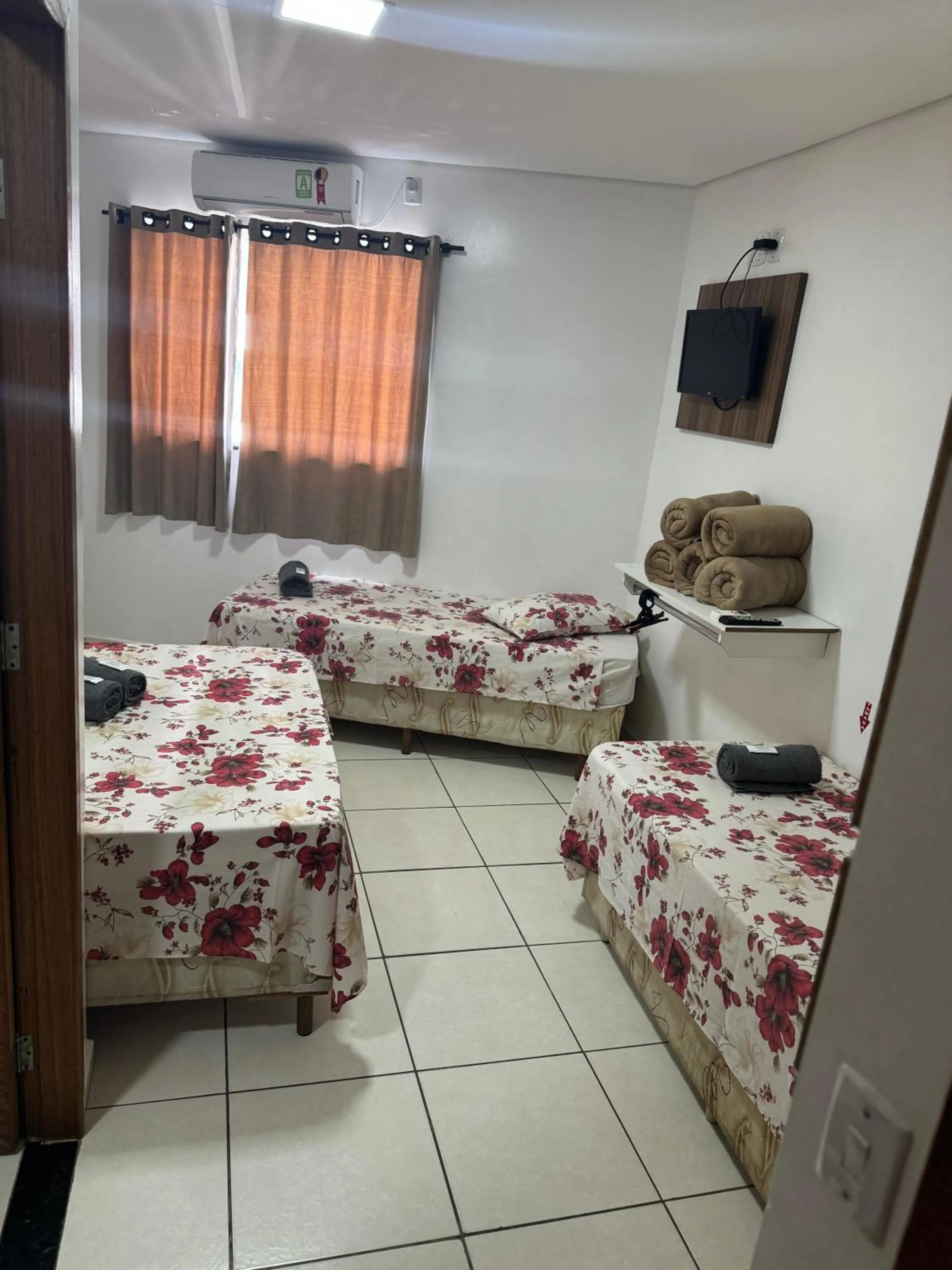 TV and multimedia, Bed in Pousada Bella Vista