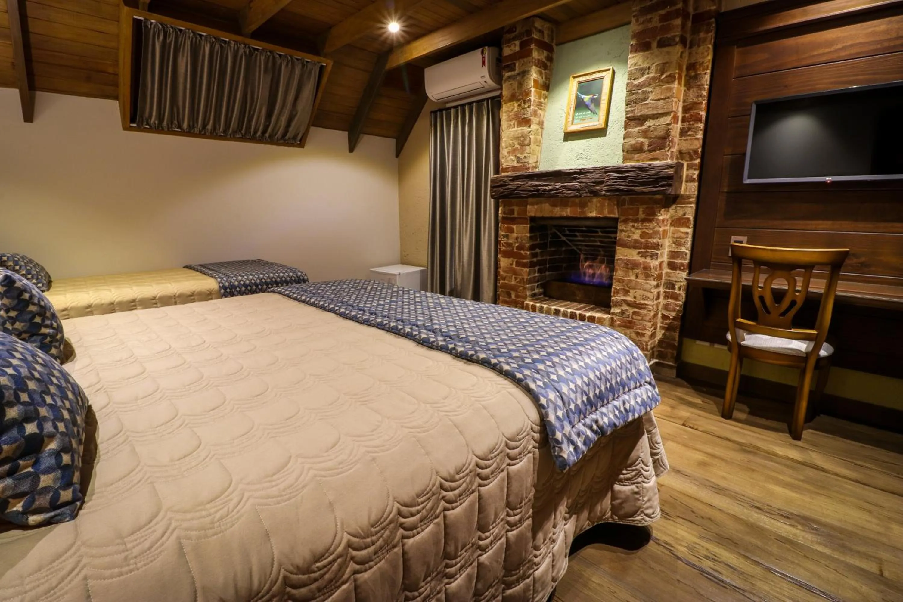 Bed in Pousada Serra Paradiso