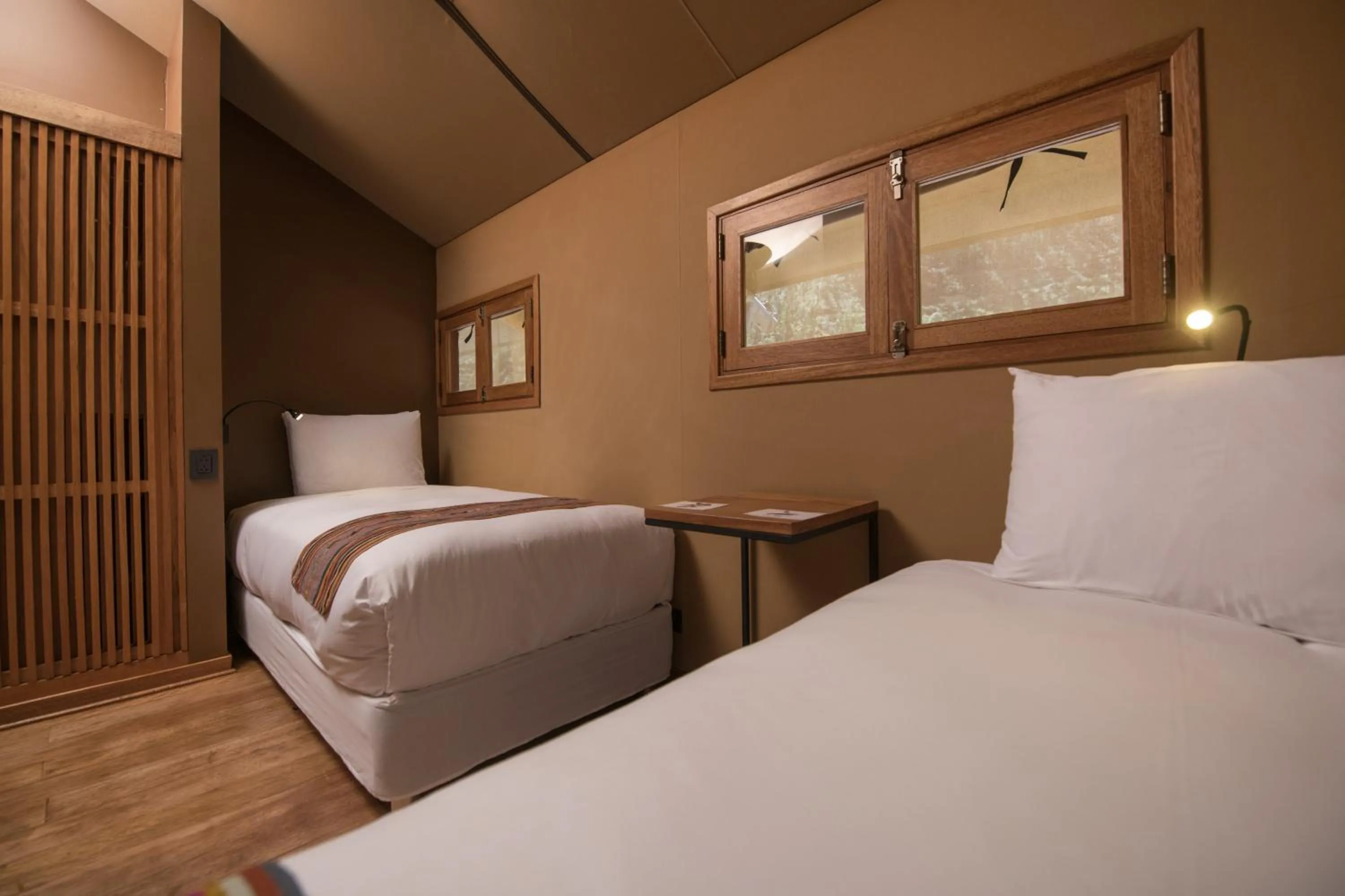 Bed in Las Qolqas EcoResort Ollantaytambo